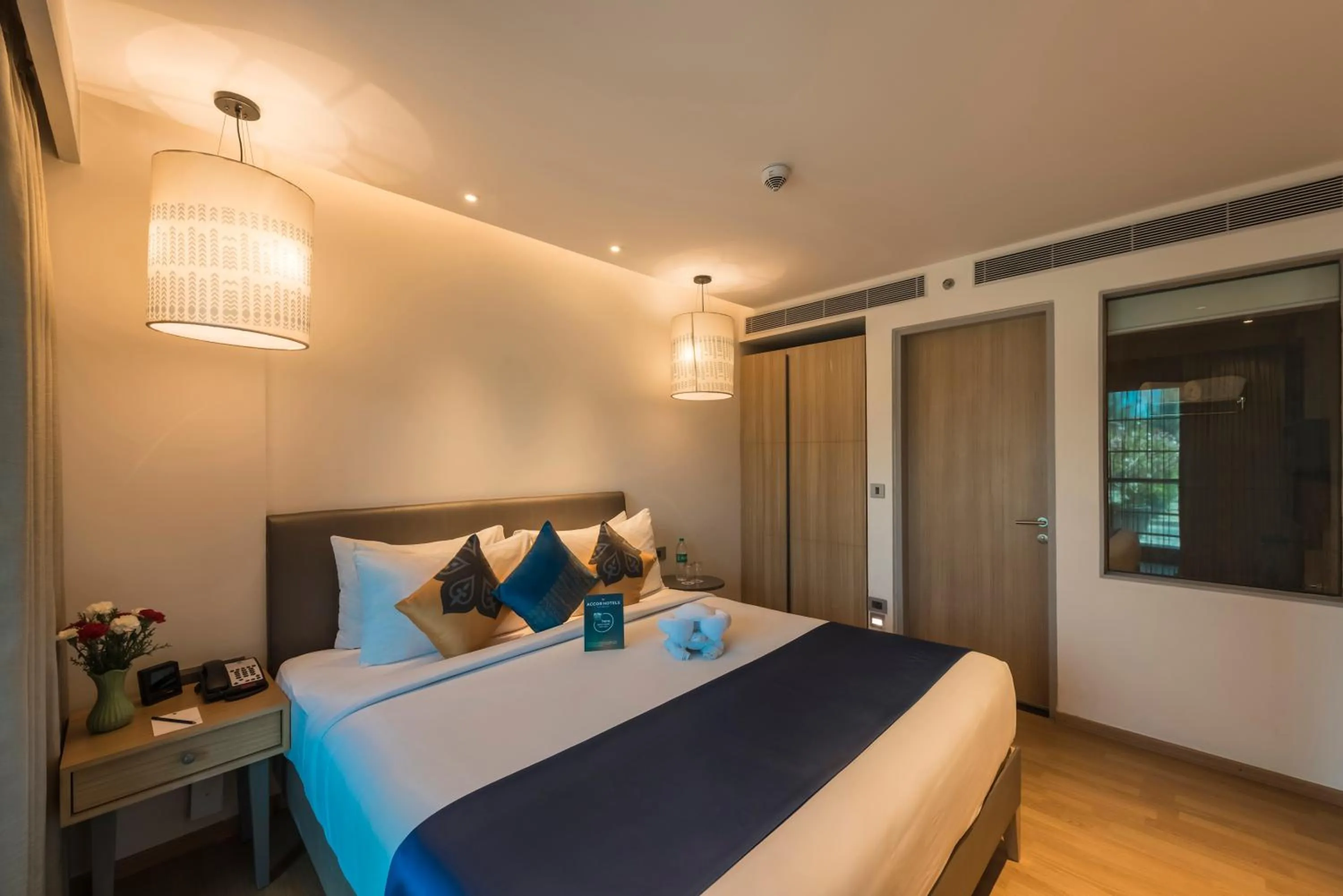 Photo of the whole room, Bed in Grand Mercure Mysore - An Accor Brand