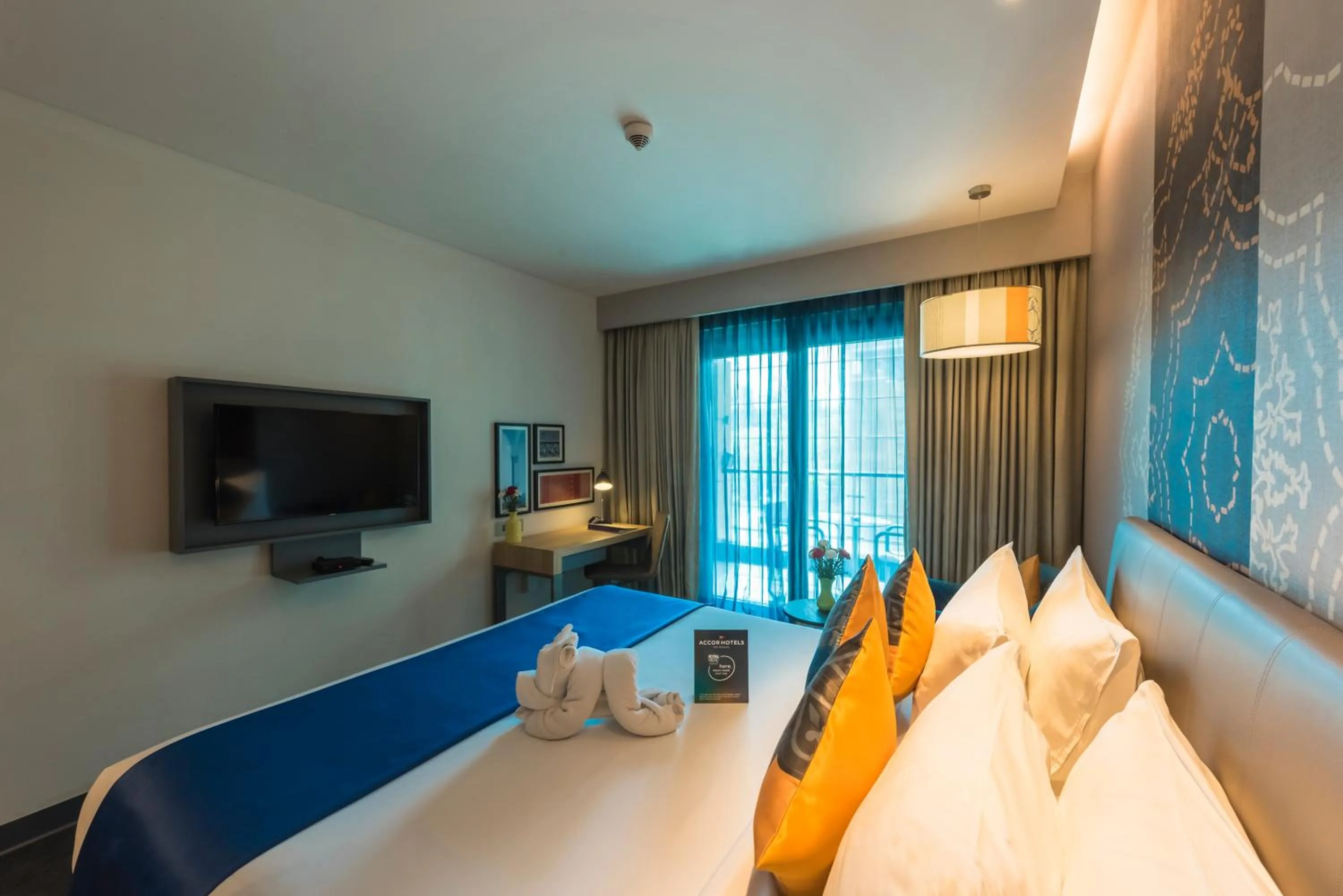 Photo of the whole room, Bed in Grand Mercure Mysore - An Accor Brand