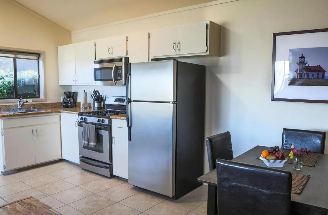 Kitchen or kitchenette in Cottages at Little River Cove