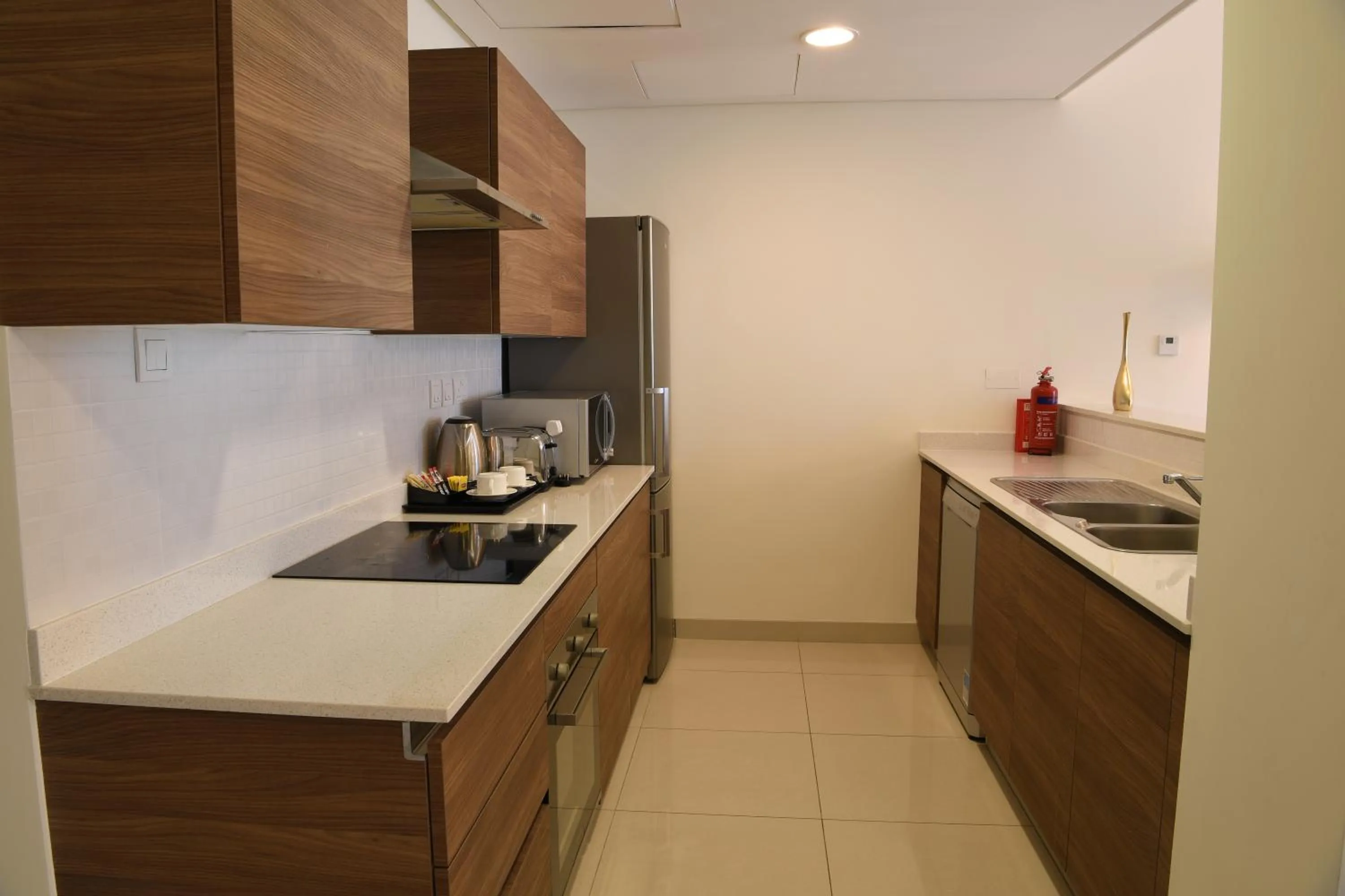 Kitchen or kitchenette in Gulf Suites Hotel Amwaj