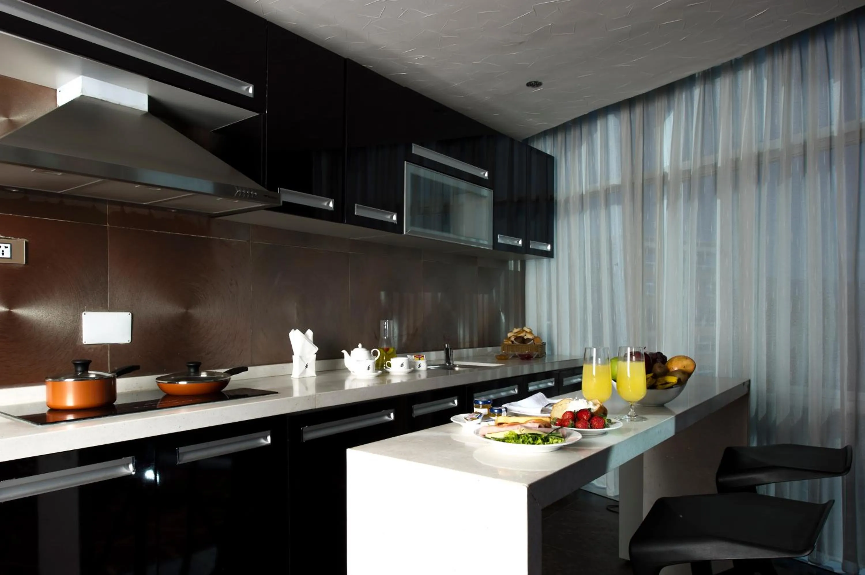 Kitchen or kitchenette in Grand Eliana Hotel Conference & Spa