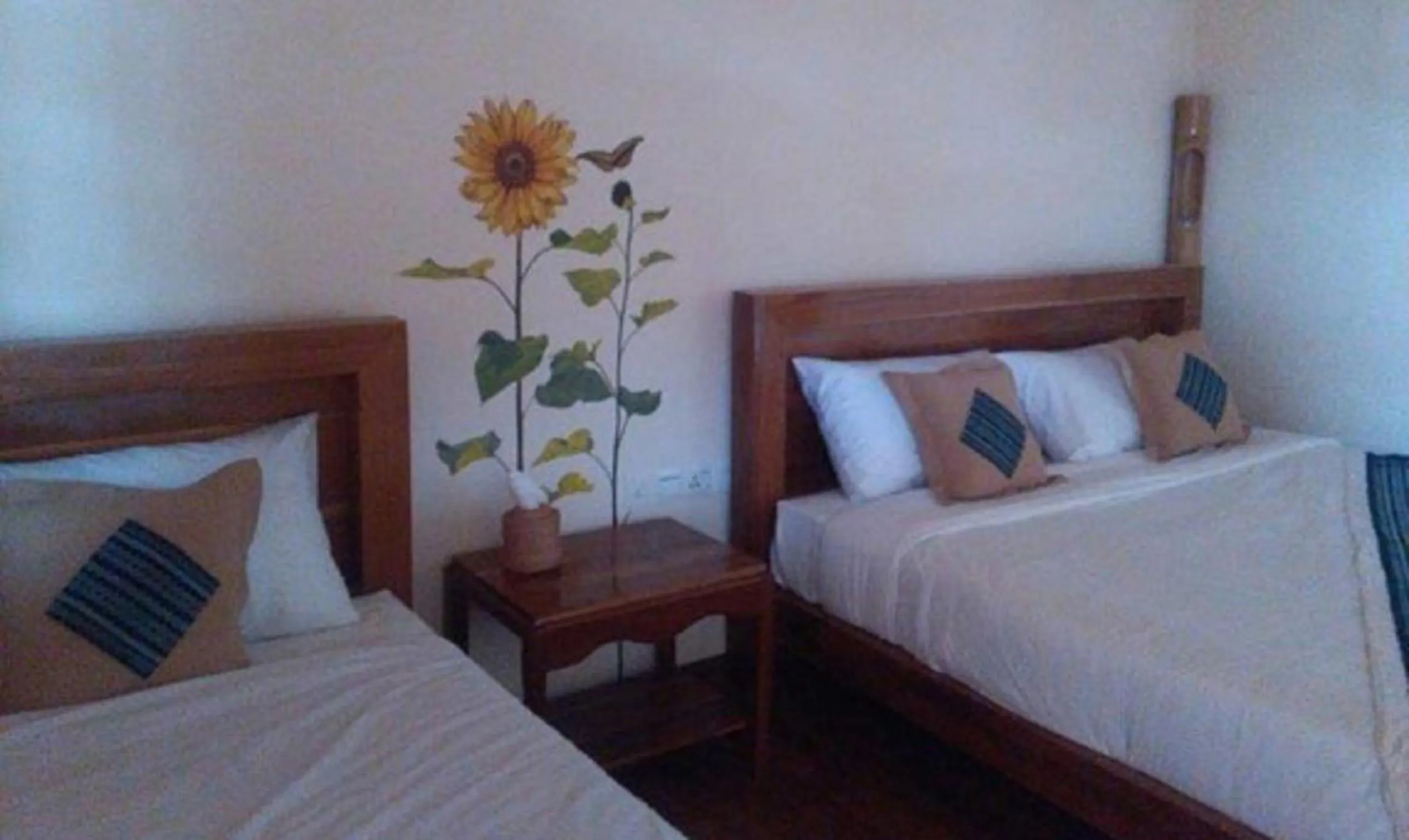 Decorative detail, Bed in Trinity Family Inn