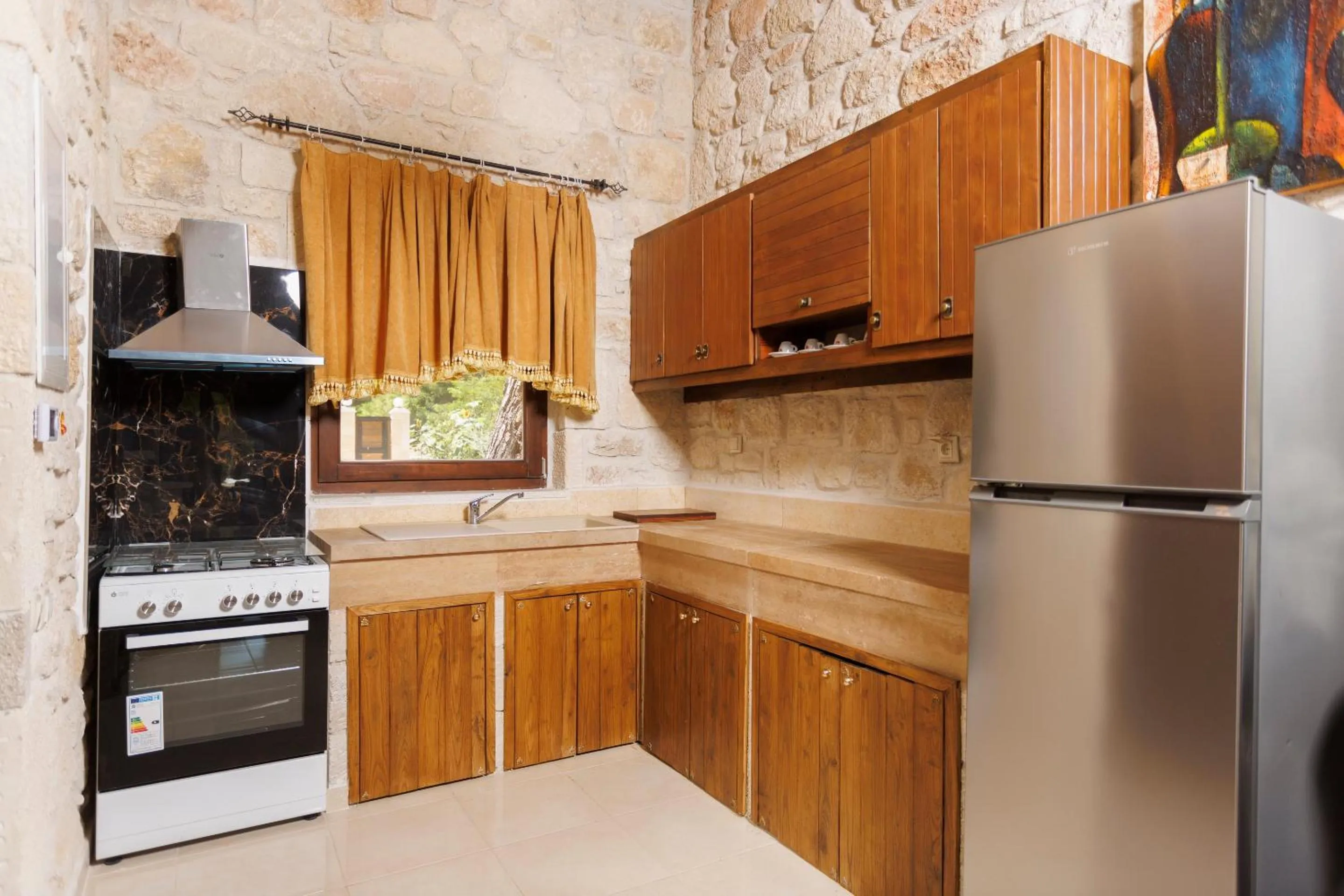 kitchen in Akritas Ef Zin Villas & Suites