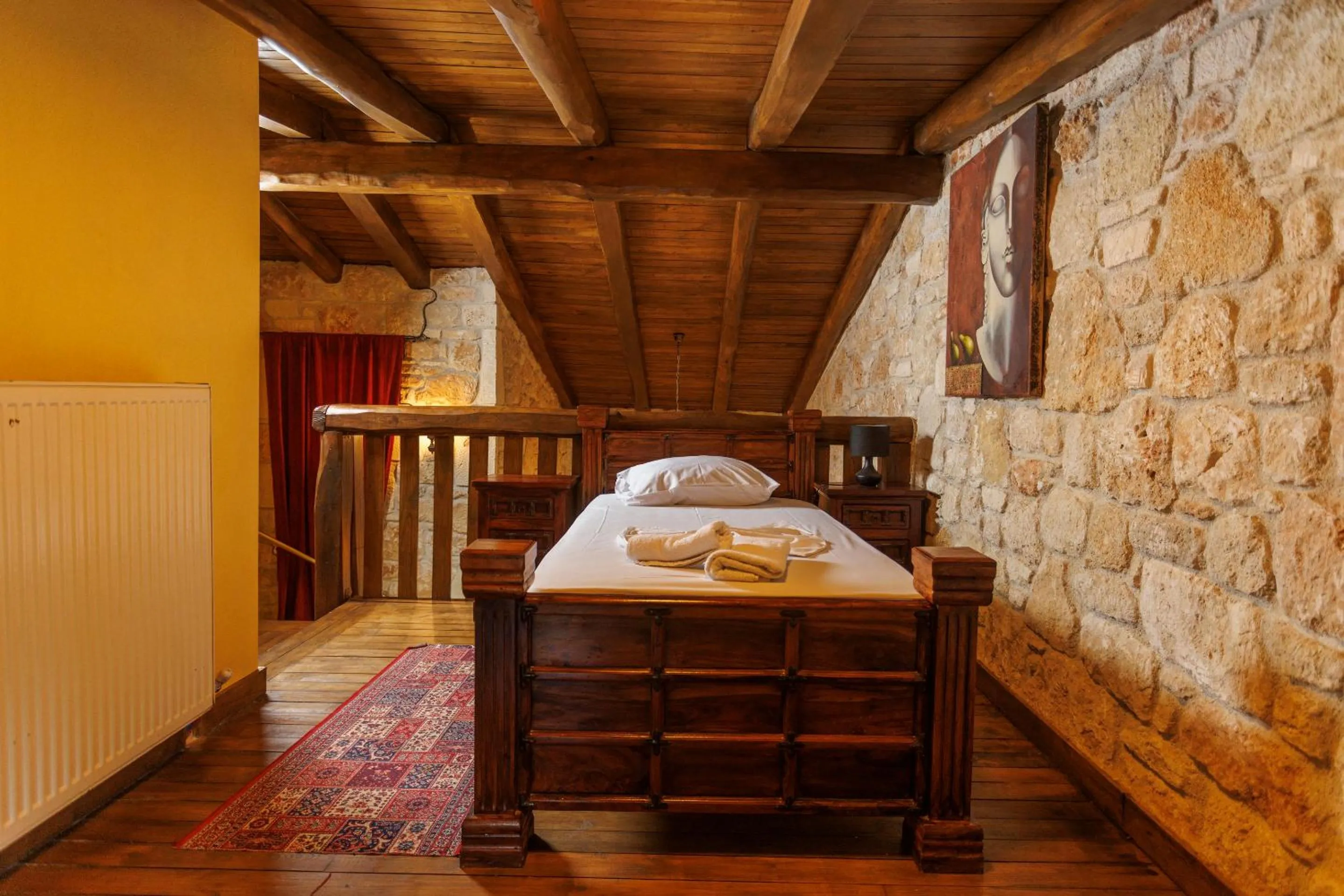 Bed in Akritas Ef Zin Villas & Suites