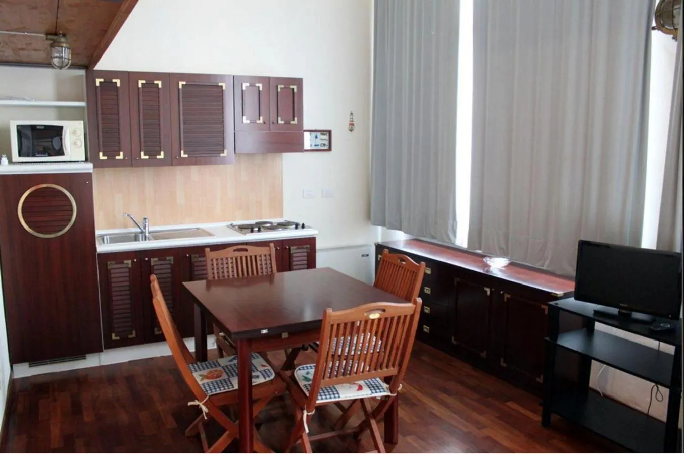 TV and multimedia in Residence Villa Marina