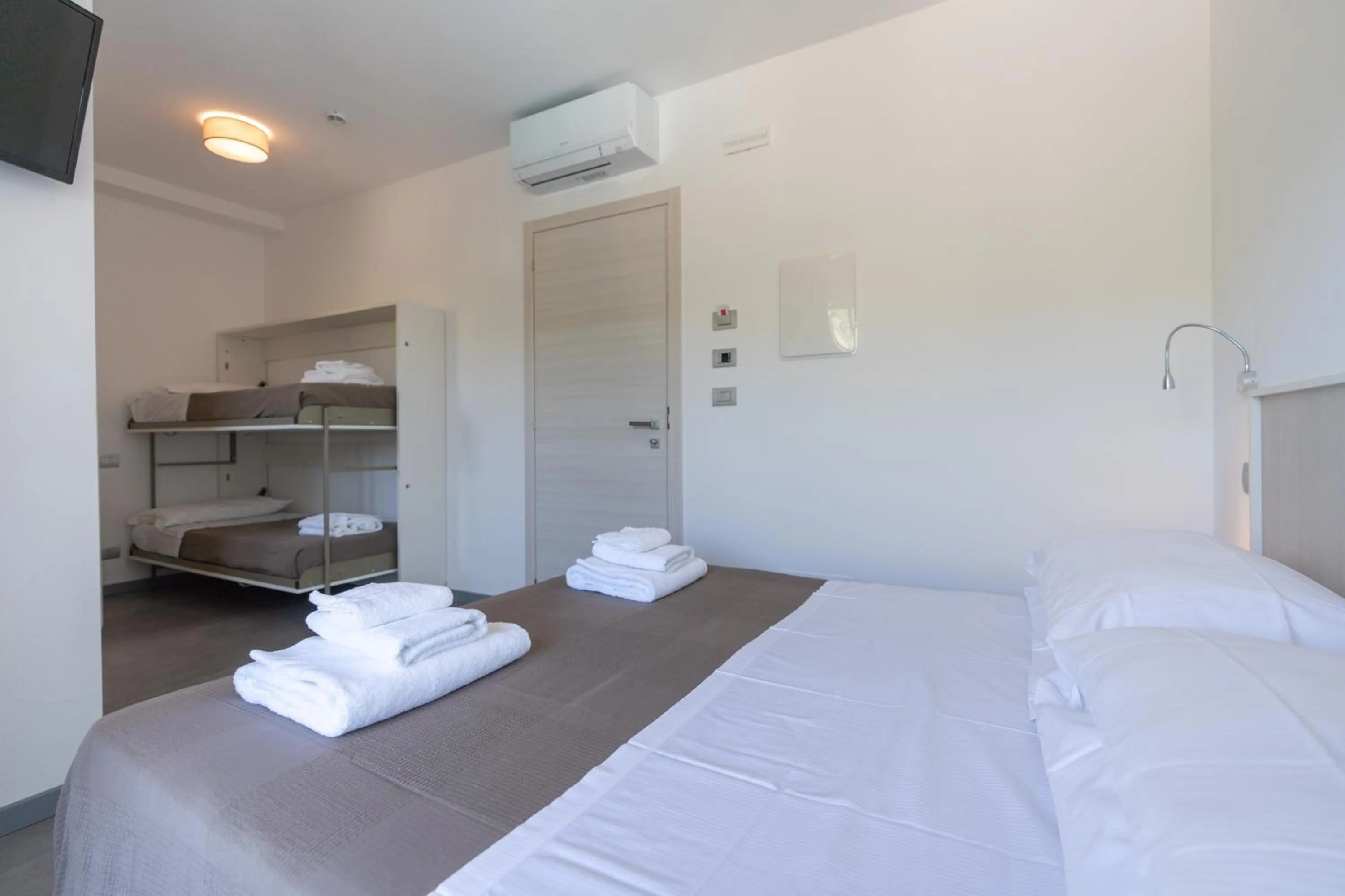 Bed in Pineto Resort