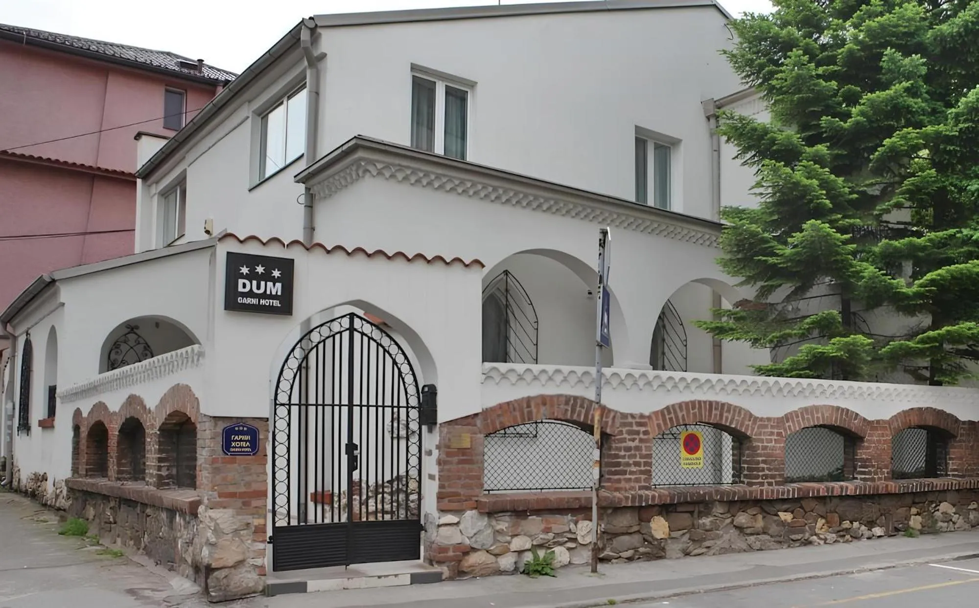 Property building in Hotel Dum by Muskat