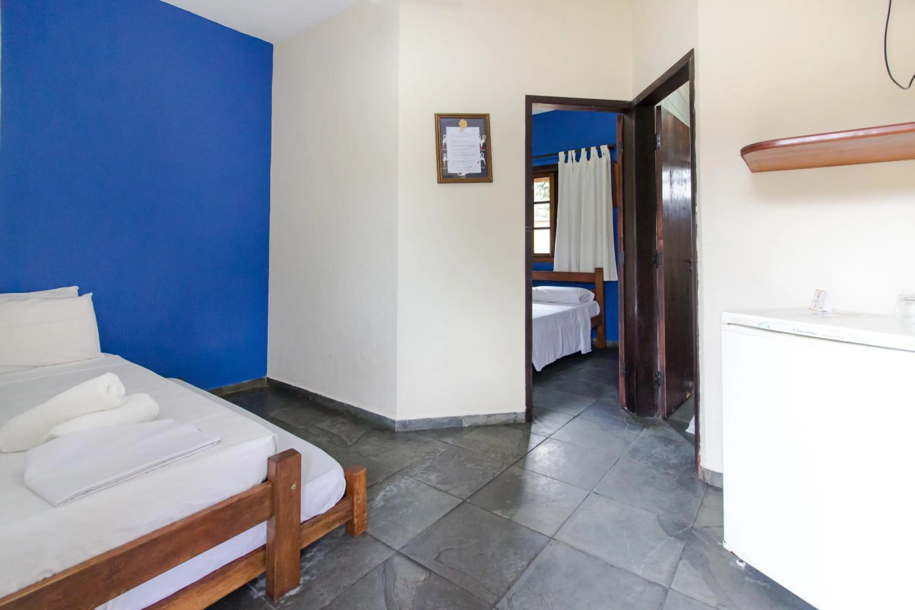 Bed in Viamar Pousada