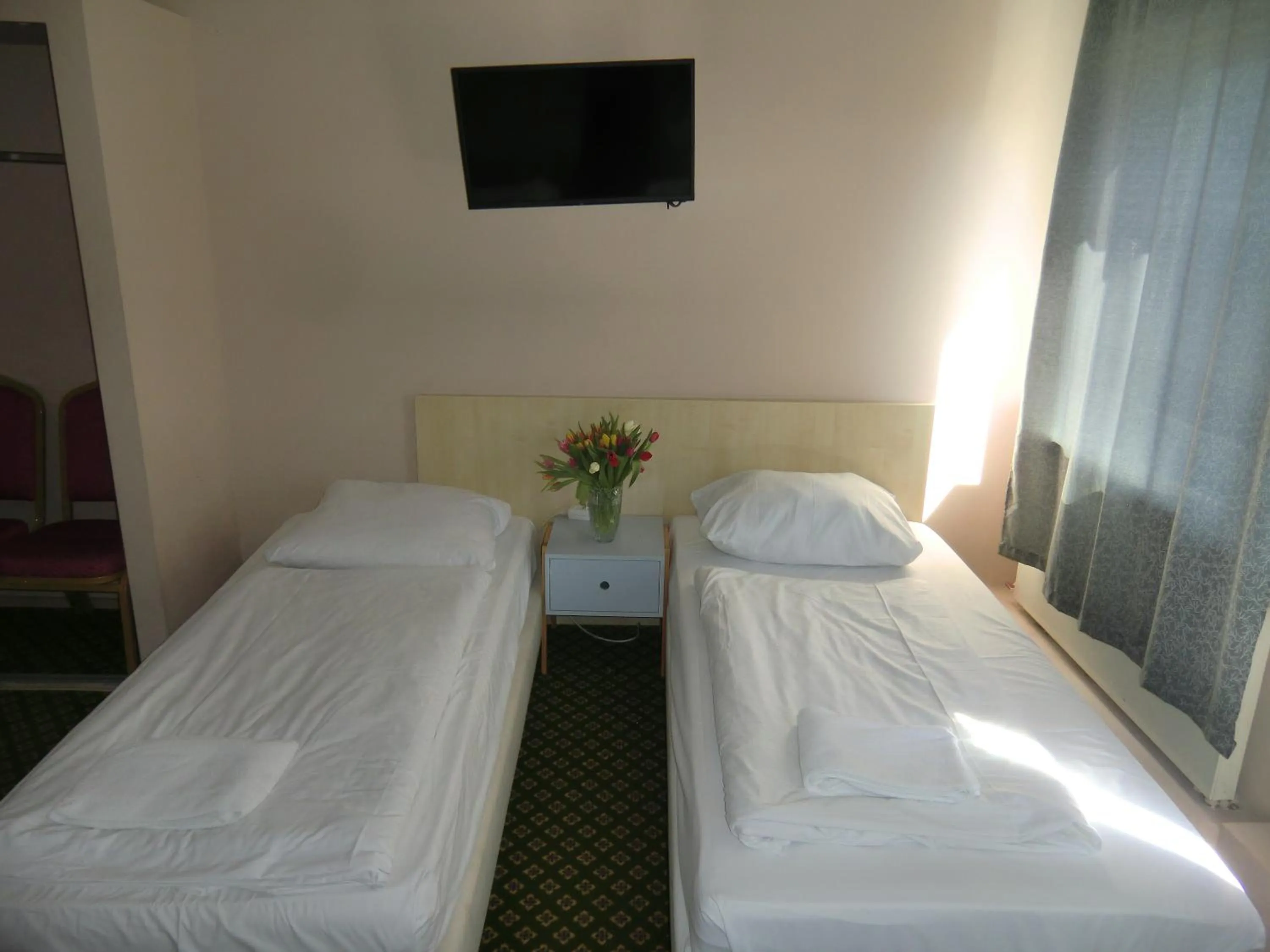 Photo of the whole room, Bed in Panorama Hotel Frankfurt Offenbach Süd