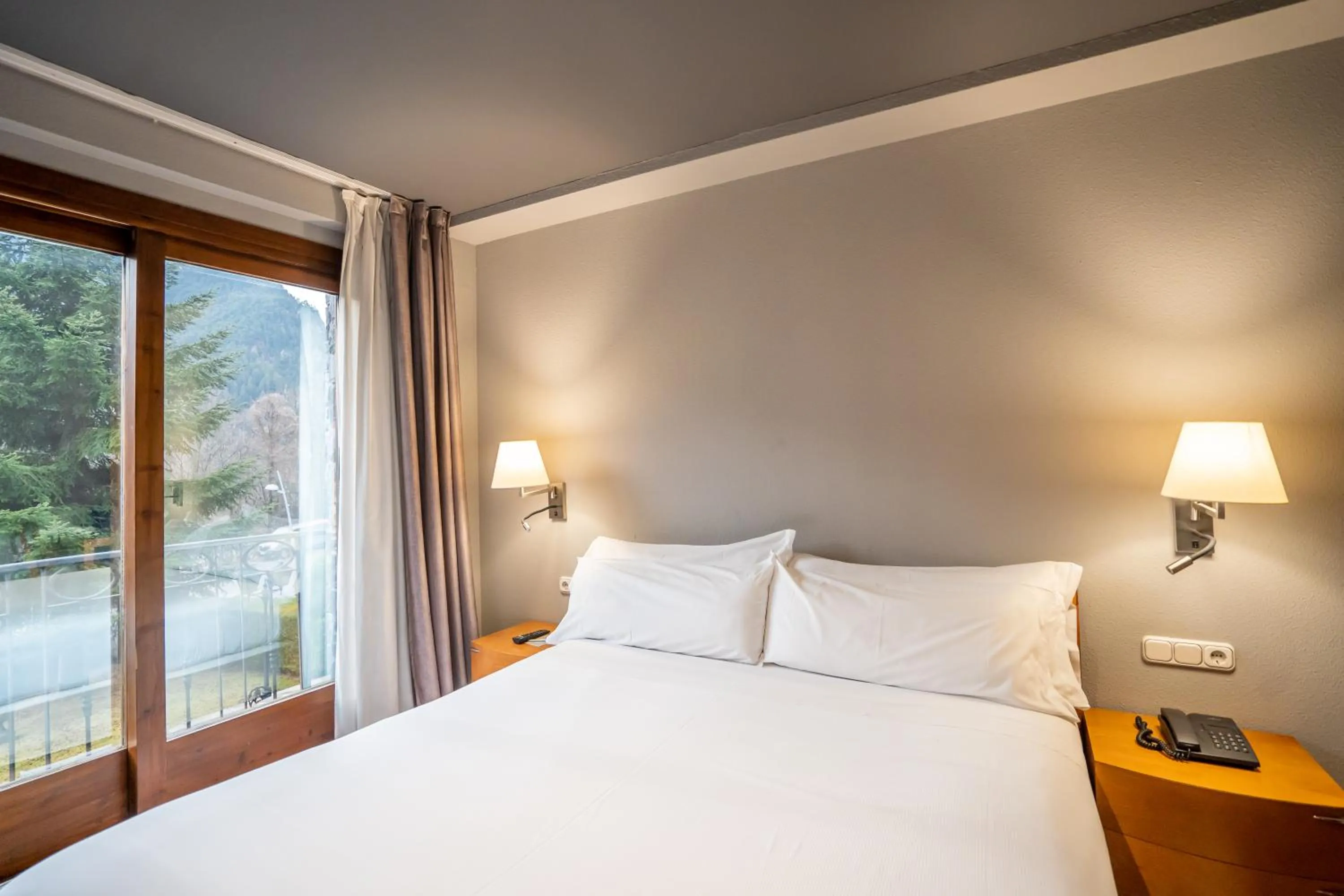 Bedroom, Bed in Abba Xalet Suites Hotel