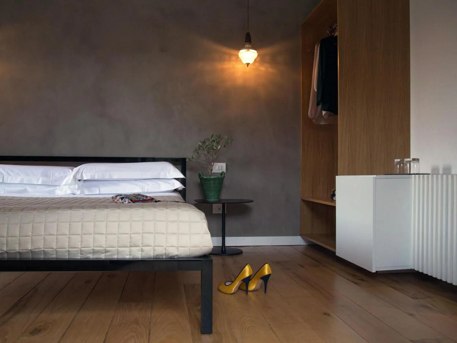 Bed in Talè Restaurant & Suite