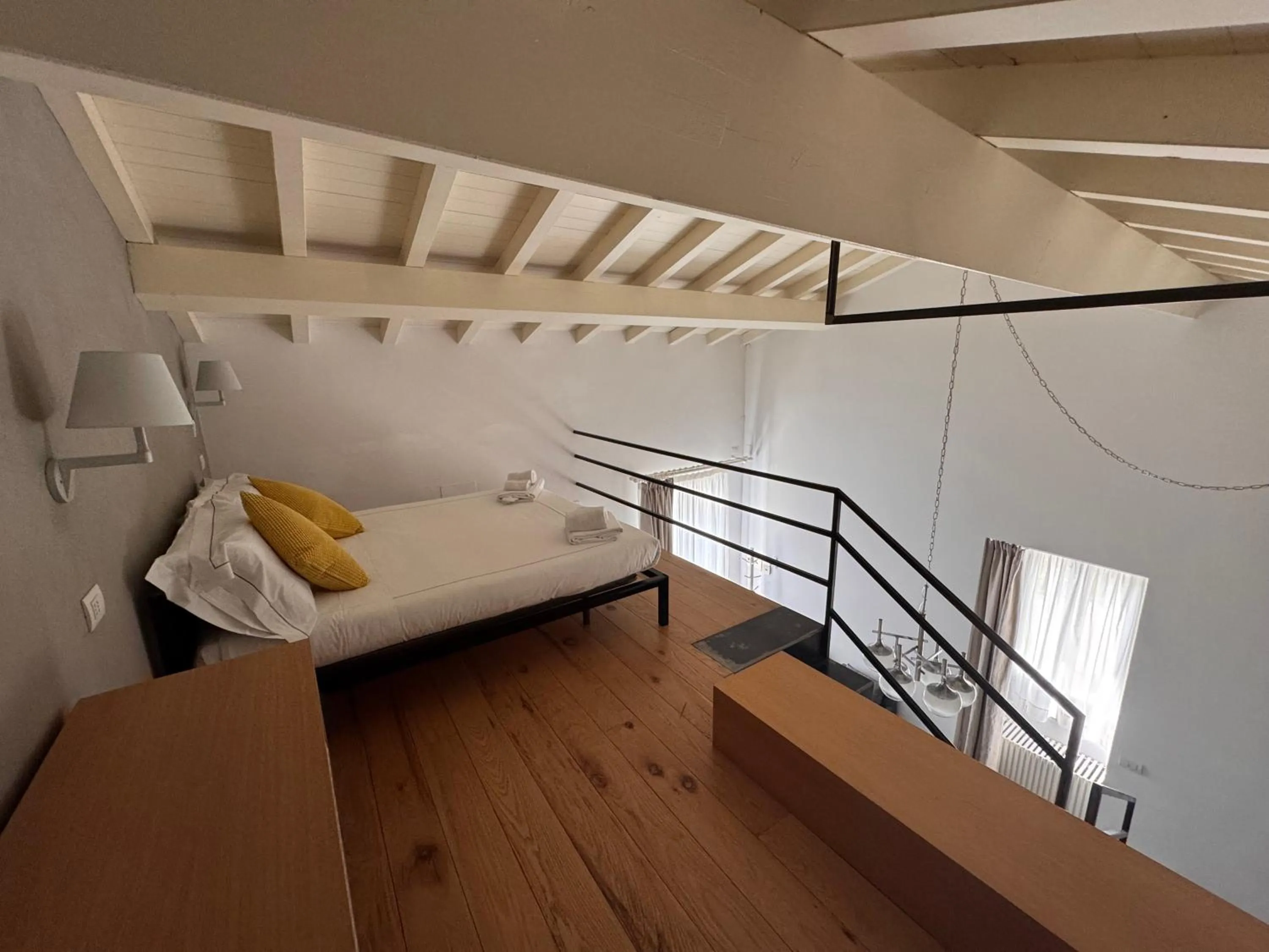 Bed in Talè Restaurant & Suite