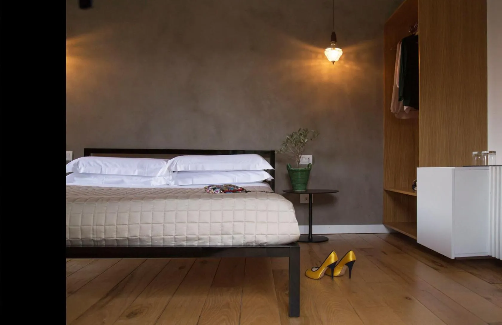 Bed in Talè Restaurant & Suite