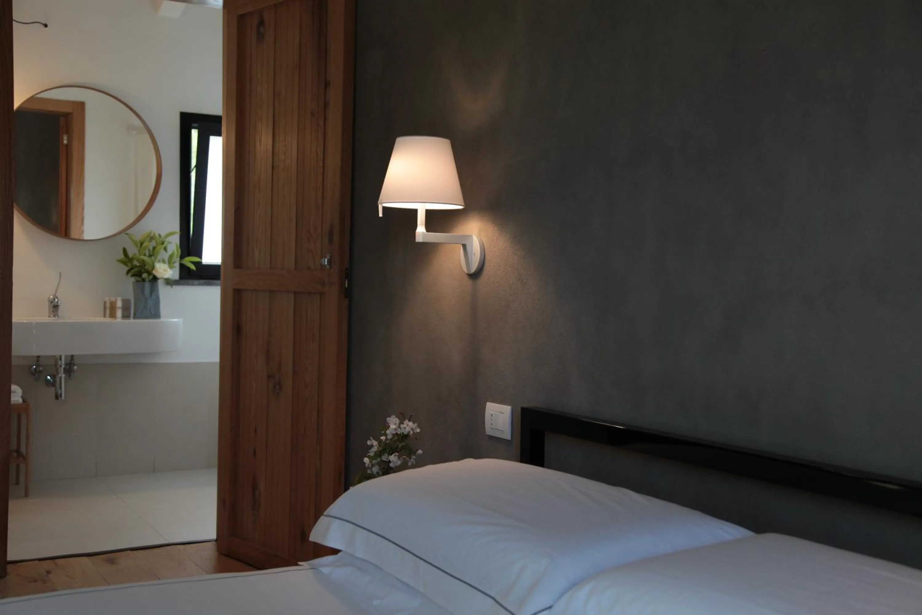 Bed in Talè Restaurant & Suite