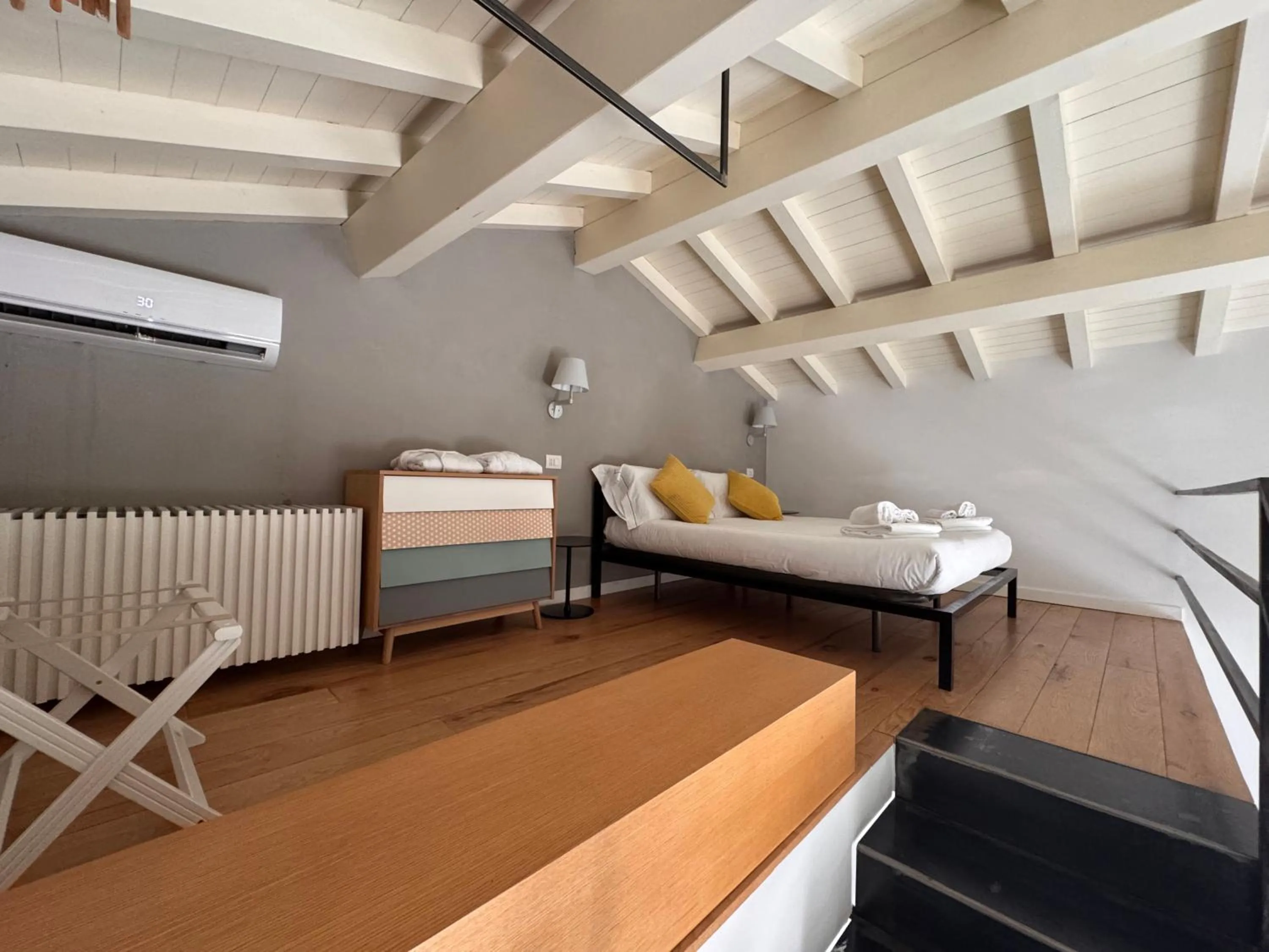 Bed in Talè Restaurant & Suite