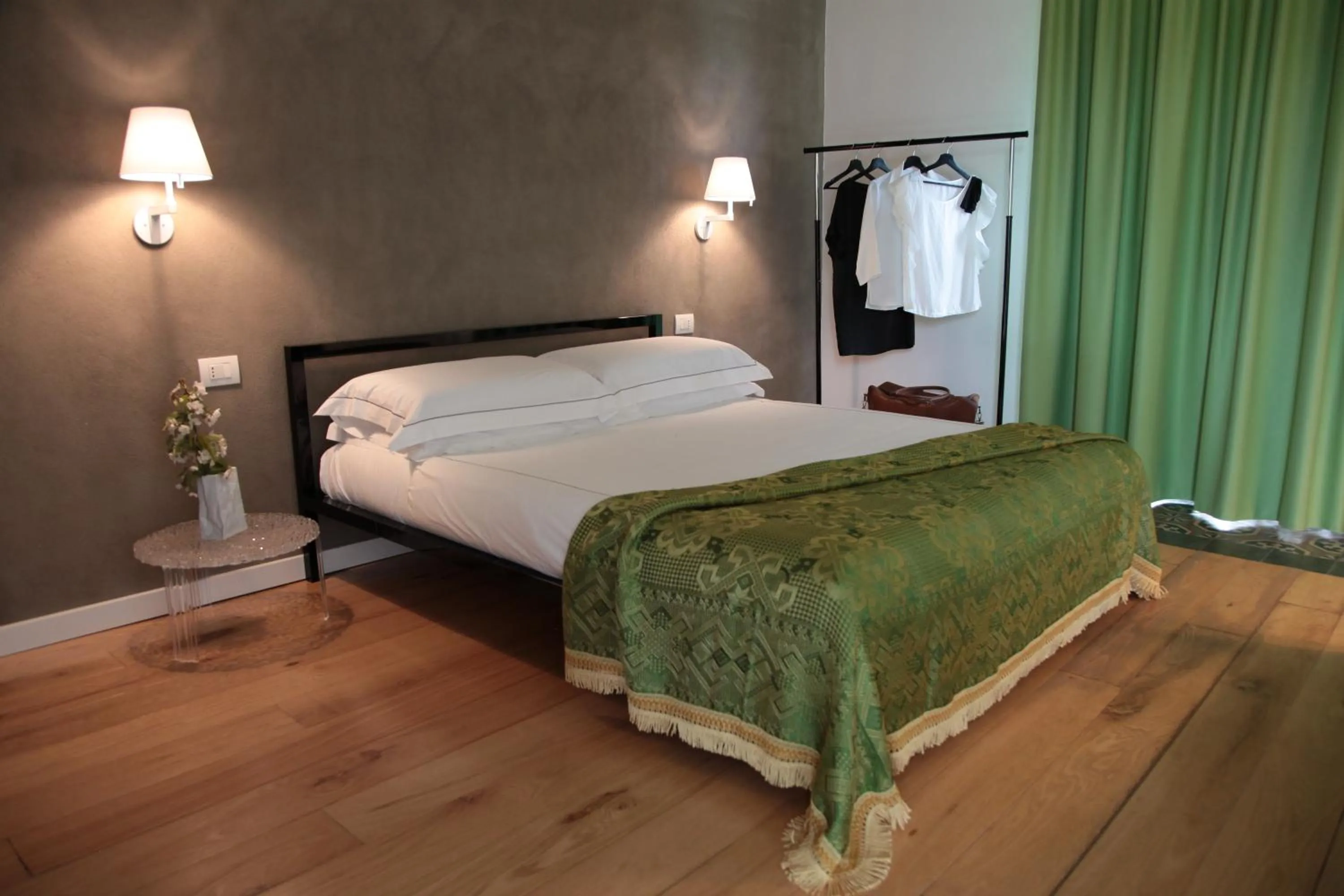 Bed in Talè Restaurant & Suite