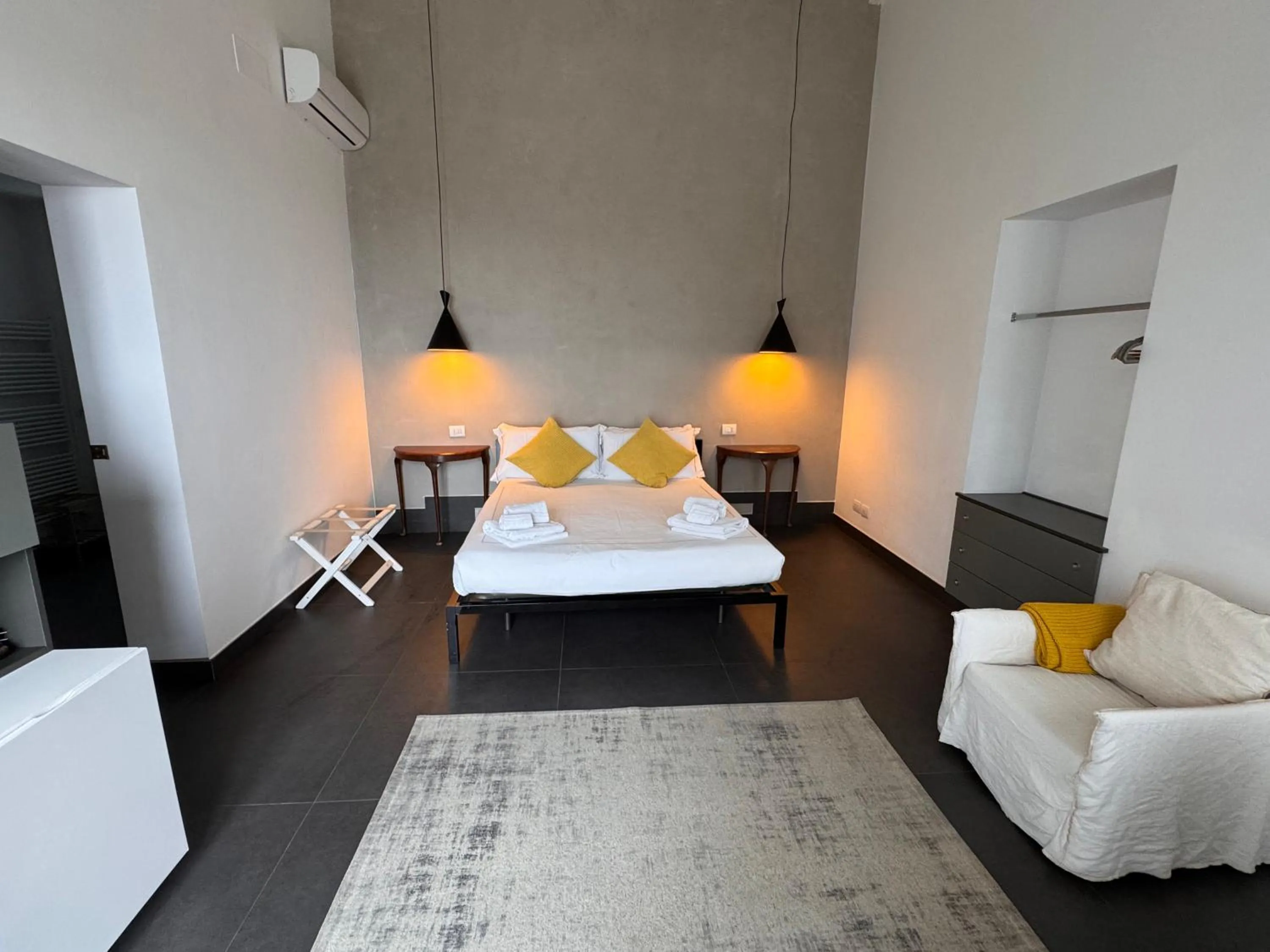 Bed in Talè Restaurant & Suite