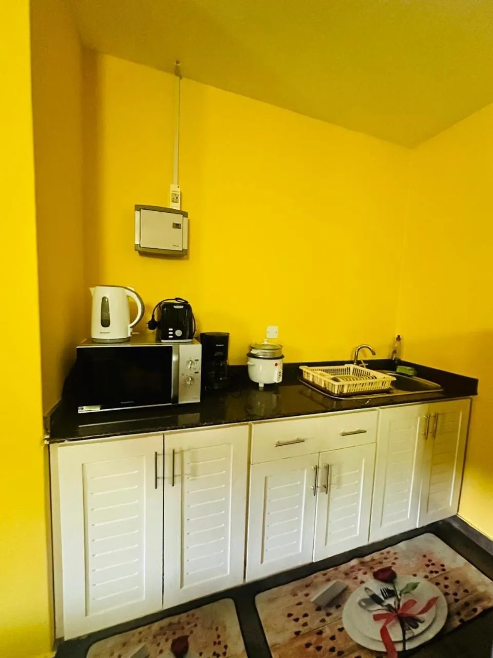 Kitchen or kitchenette in Alha Villa