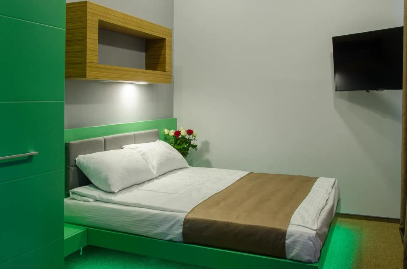 Photo of the whole room, Bed in Pushkinskaya Apartments