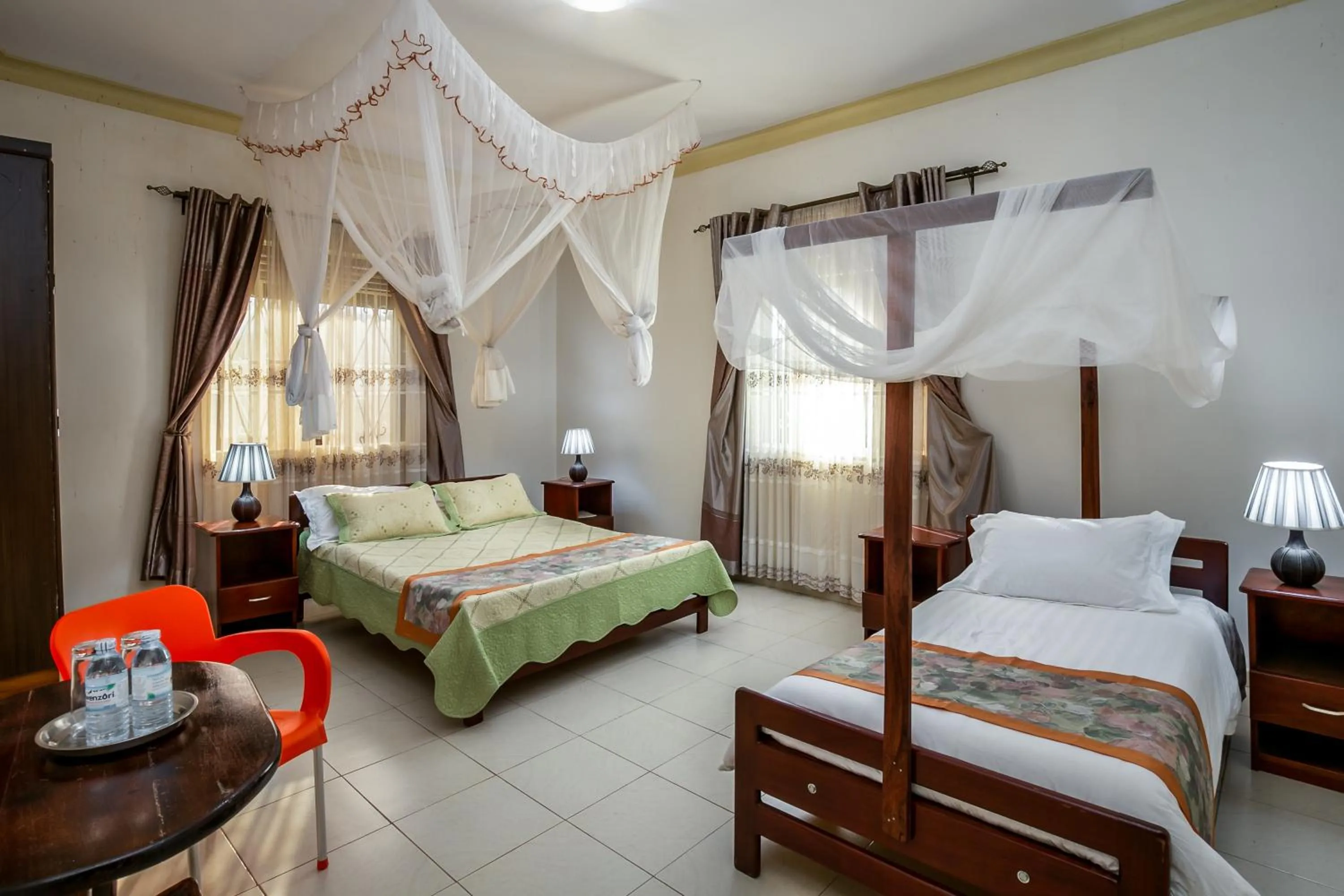 Bedroom, Bed in The Crested Crane Bwindi Hotel