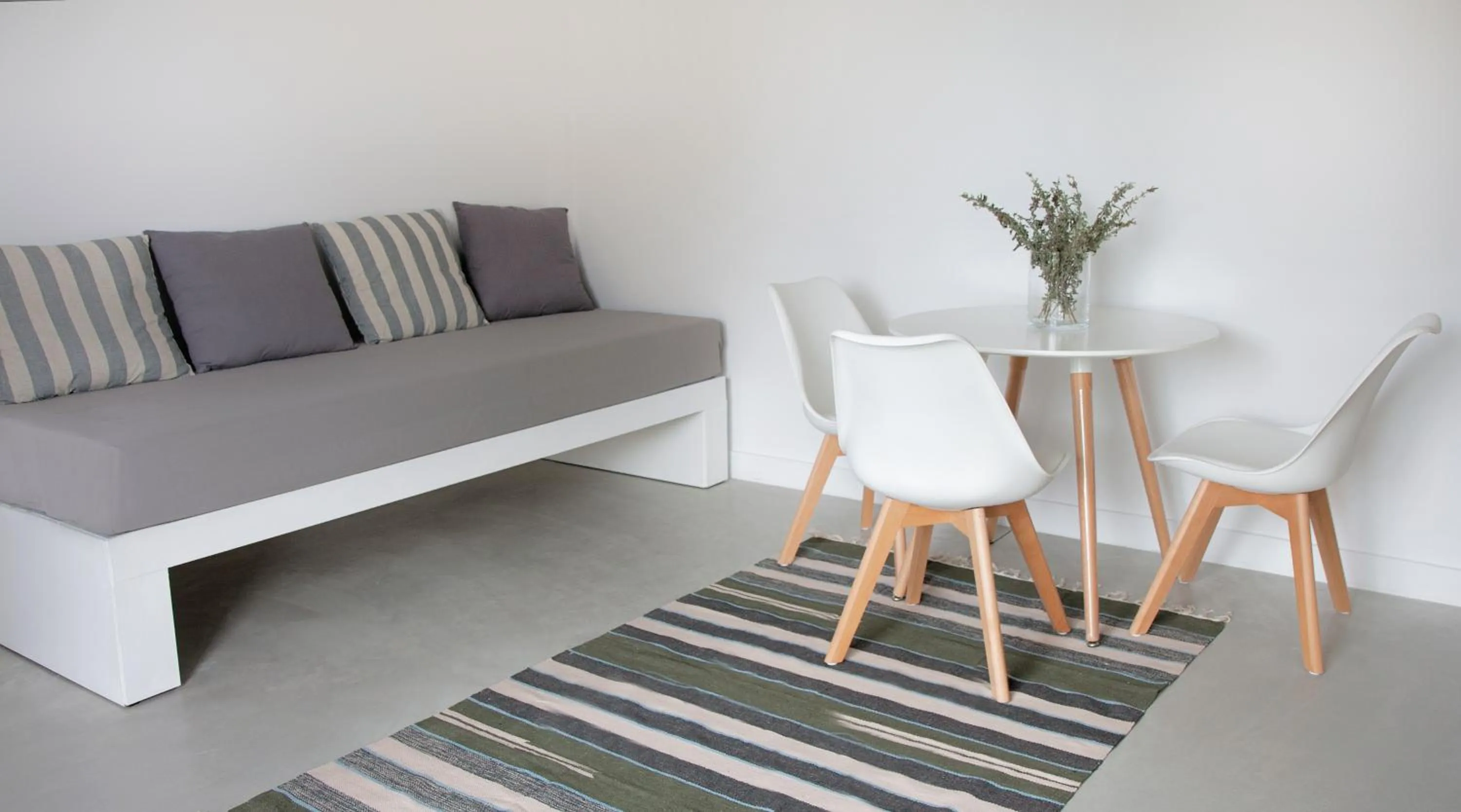 Bed in Axos Apartments