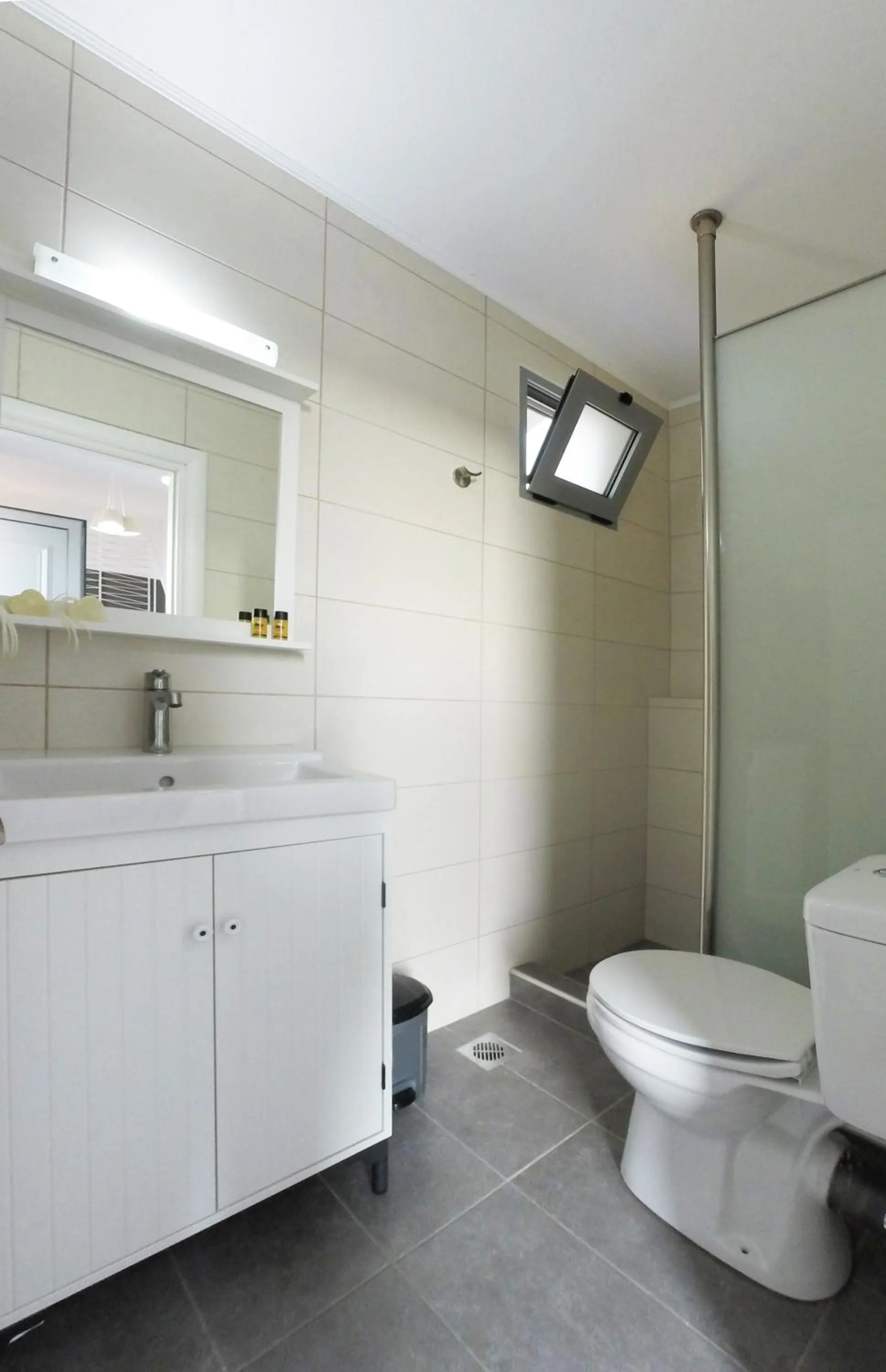 Bathroom in Axos Apartments