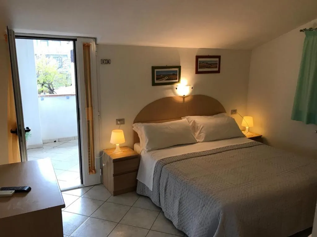 Bed in Albergo Rispescia