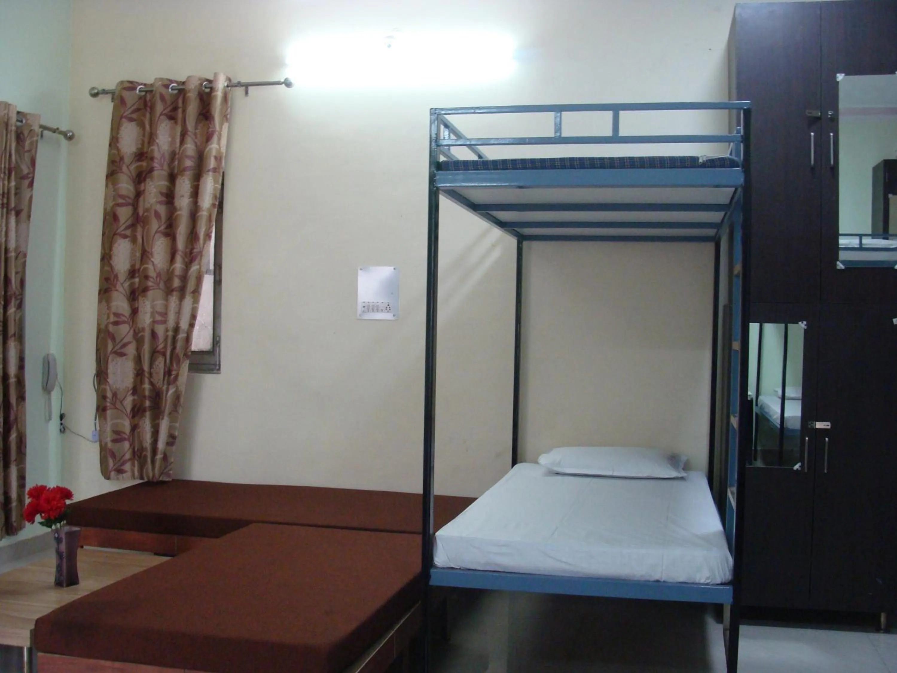 Living room, Bed in Hotel Abhinandan Grand