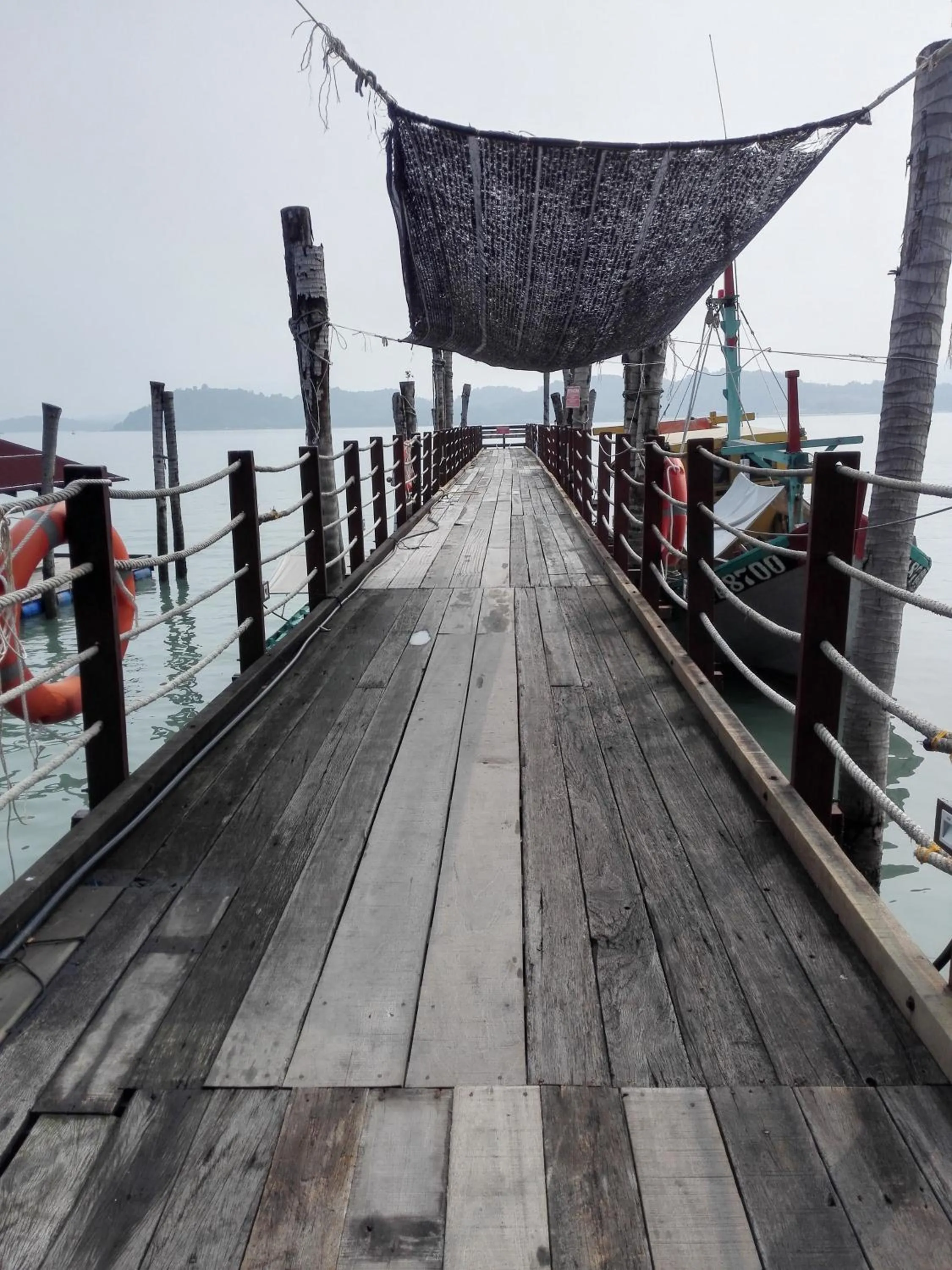 Communal lounge/ TV room in Pangkor Home Sea Village