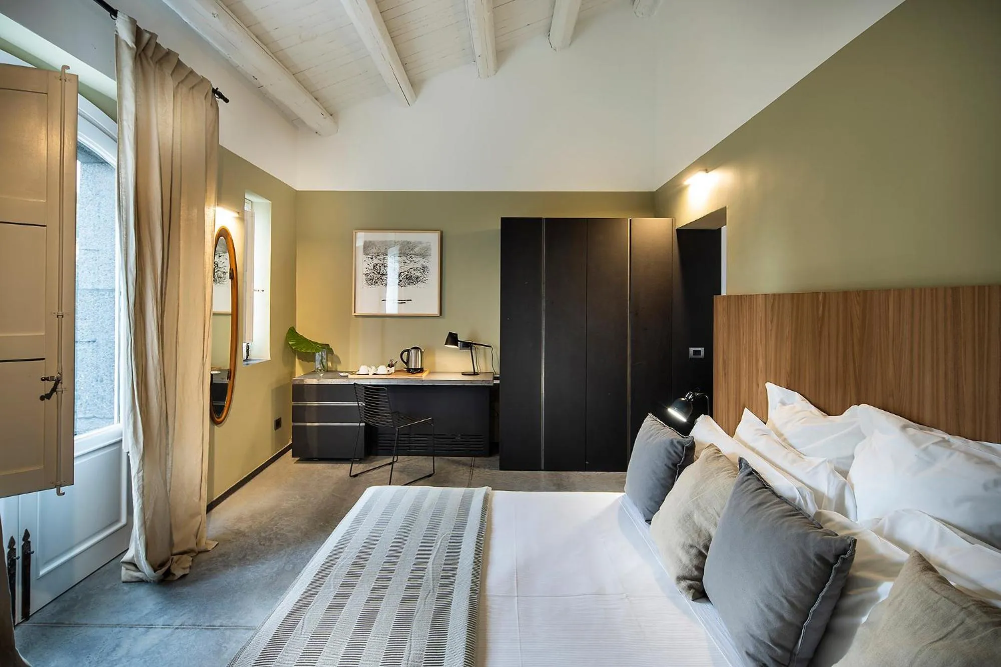 Bed in Donna Carmela Resort & Lodges