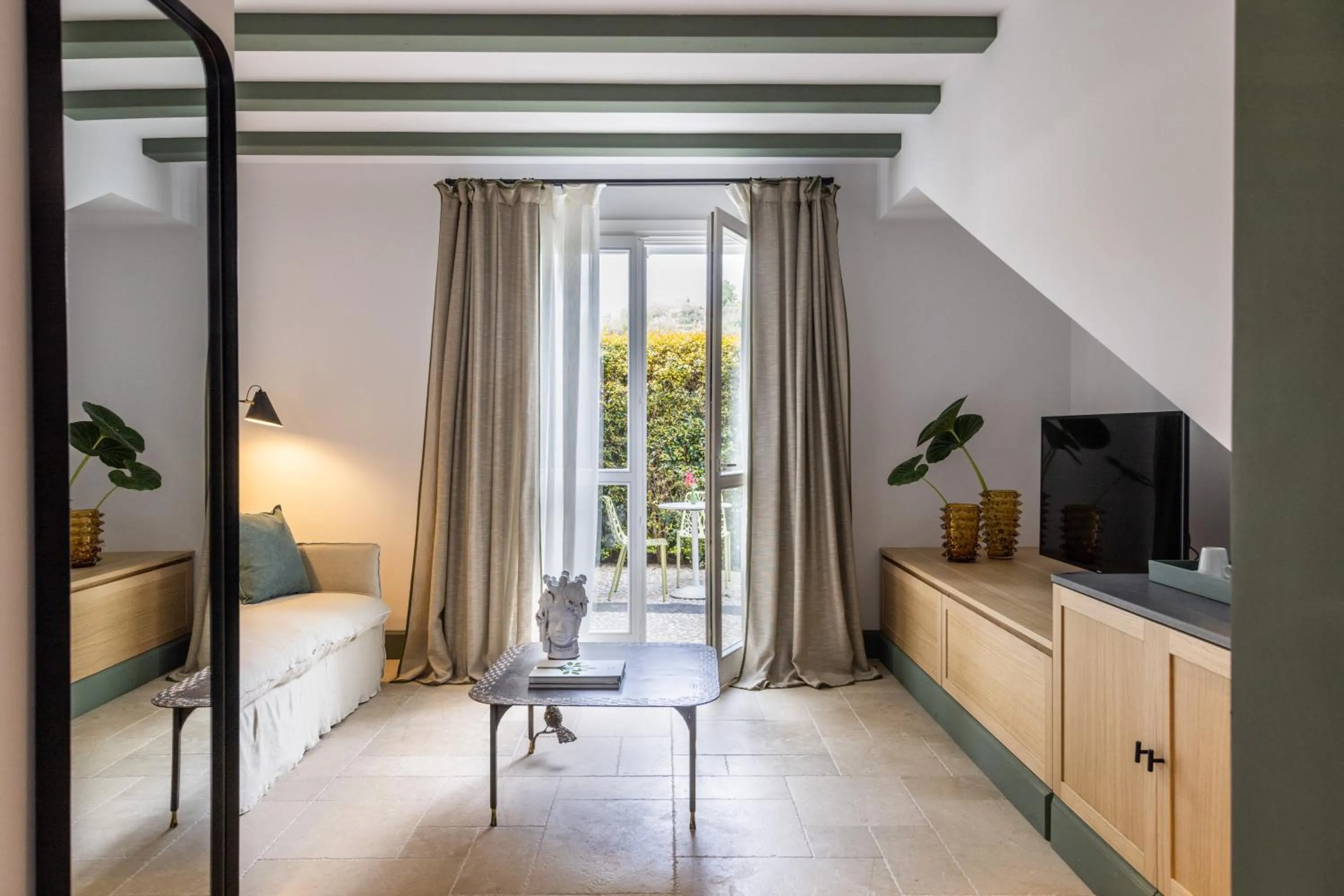 Bed in Donna Carmela Resort & Lodges