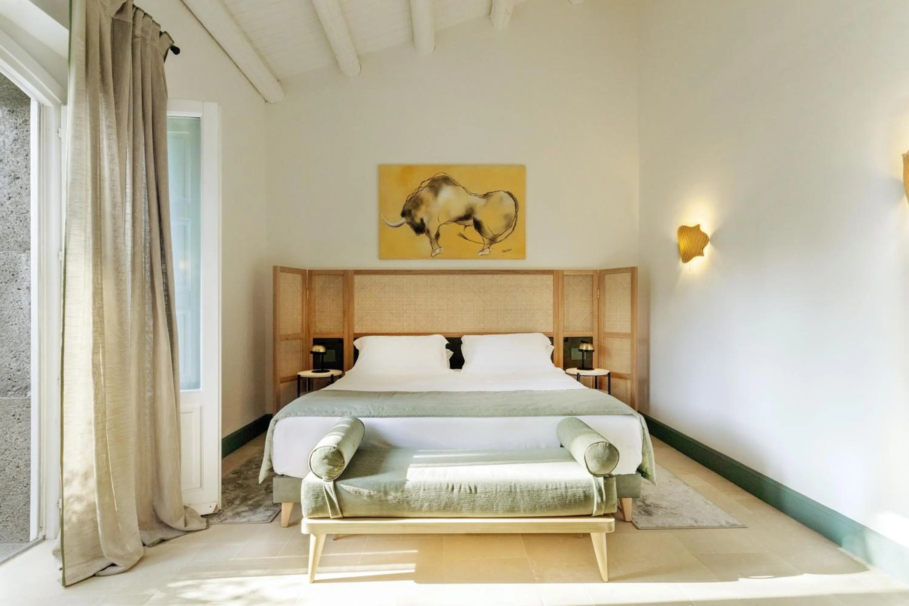 Bed in Donna Carmela Resort & Lodges