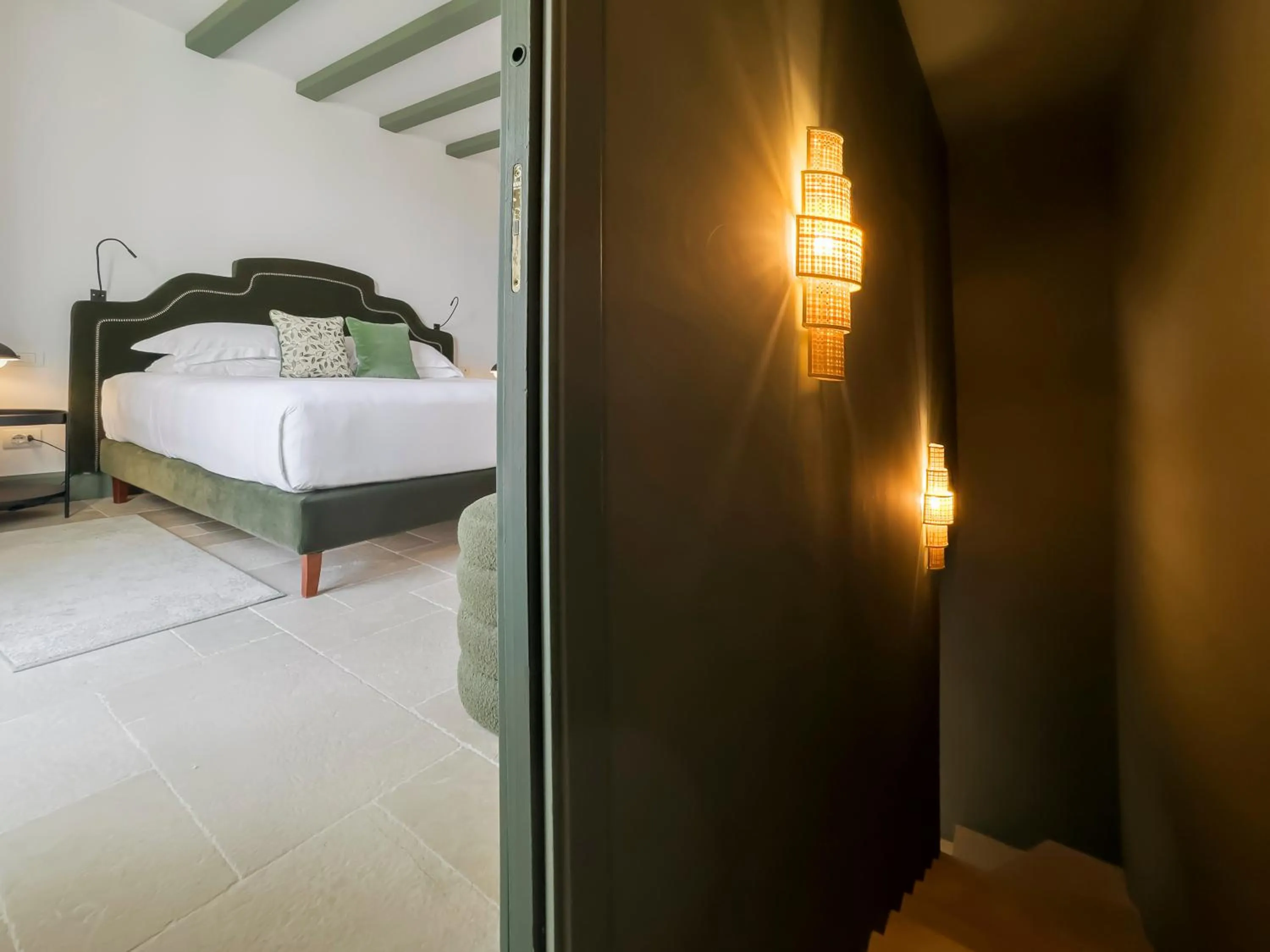 Bed in Donna Carmela Resort & Lodges