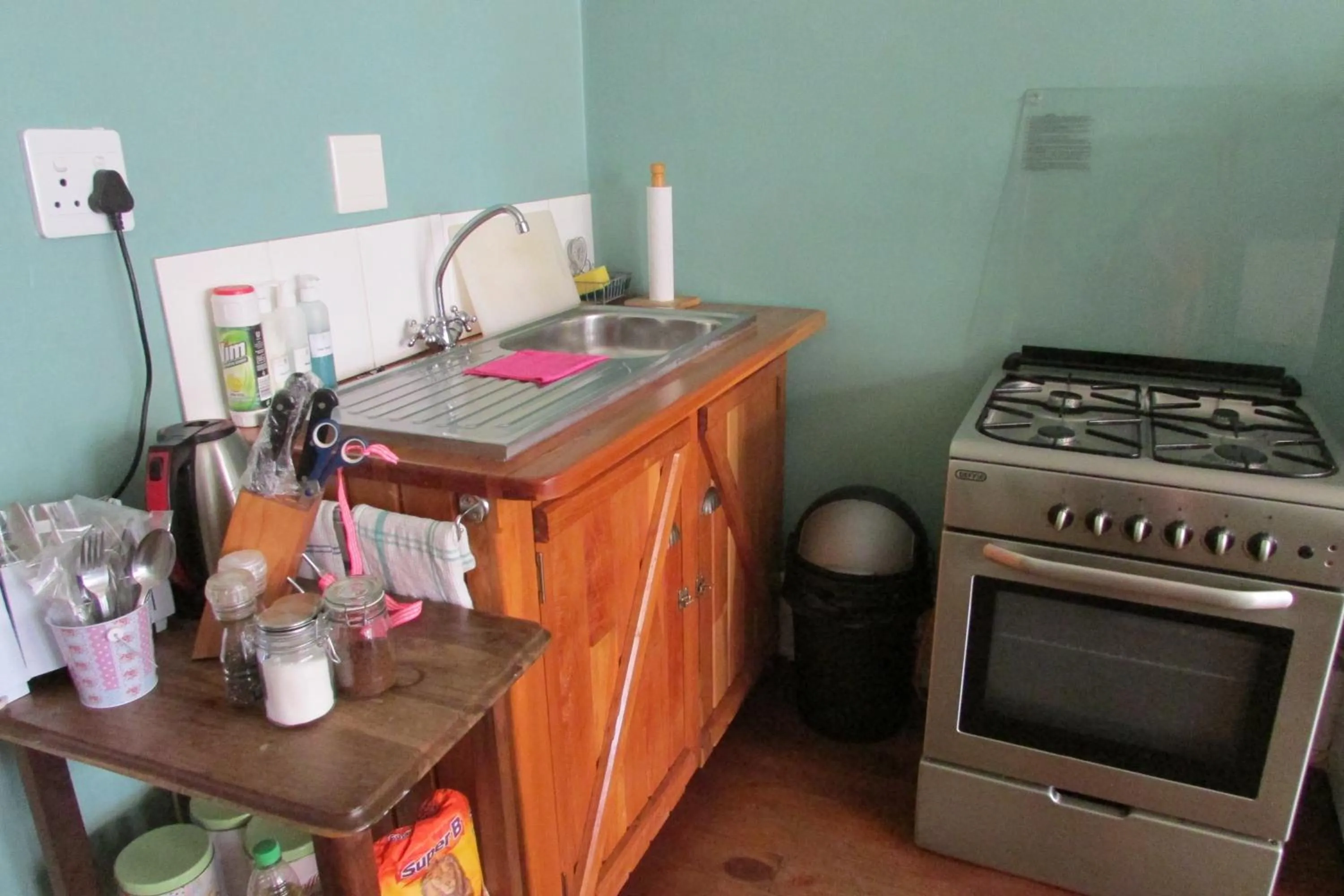 Kitchen or kitchenette in Absolute Leisure Cottages