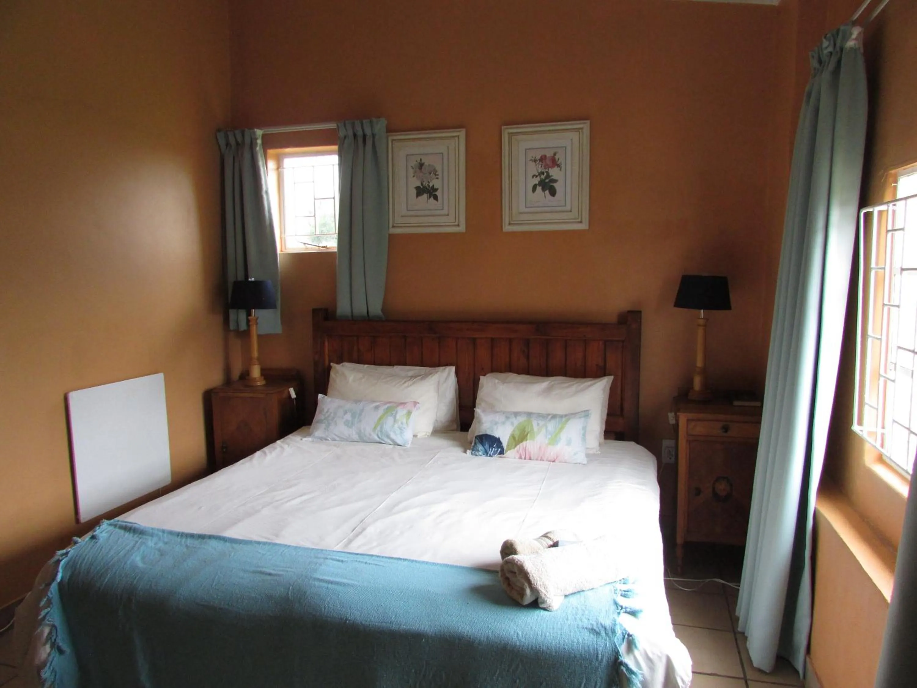 Bed in Absolute Leisure Cottages