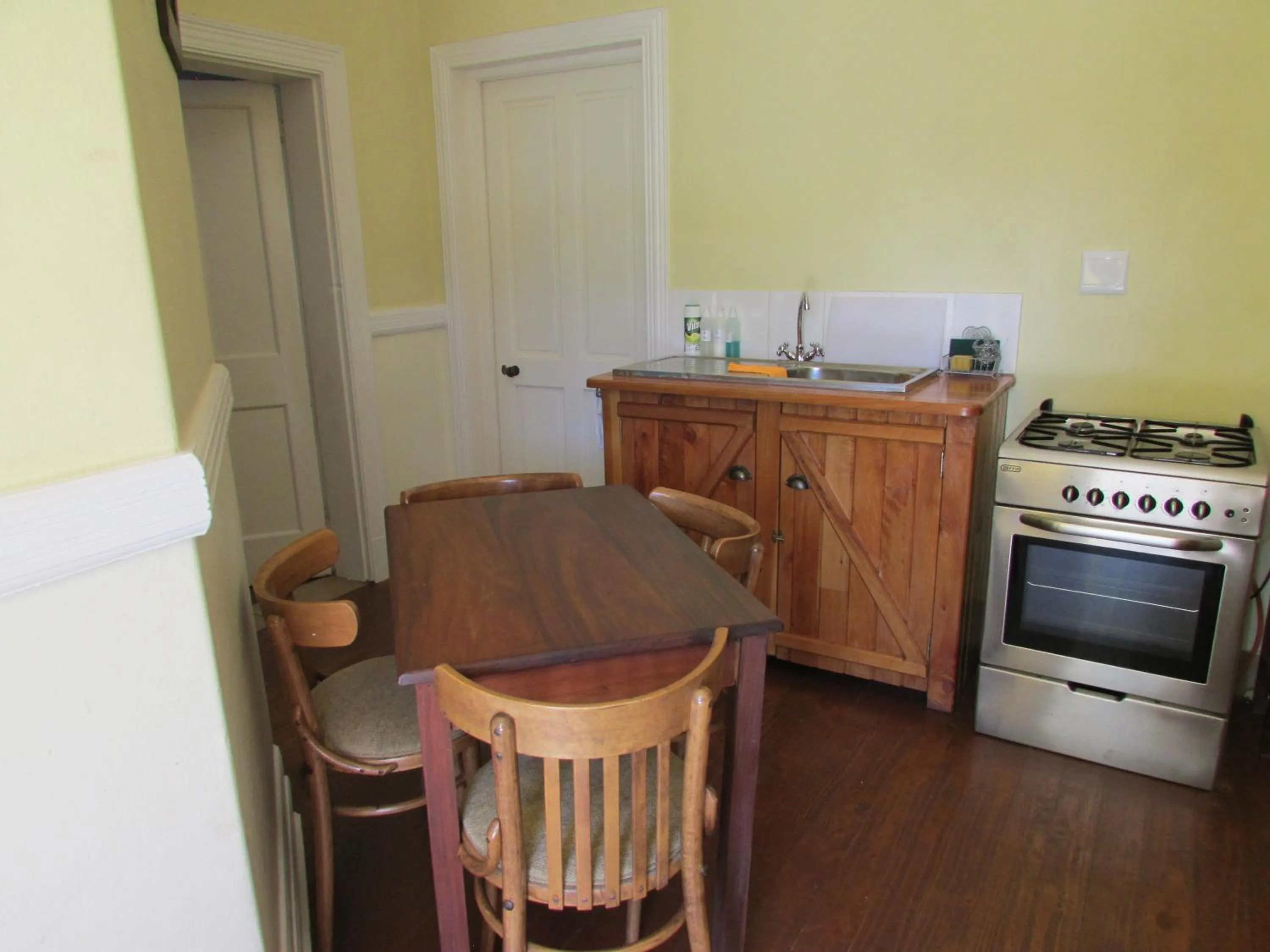 Kitchen or kitchenette in Absolute Leisure Cottages