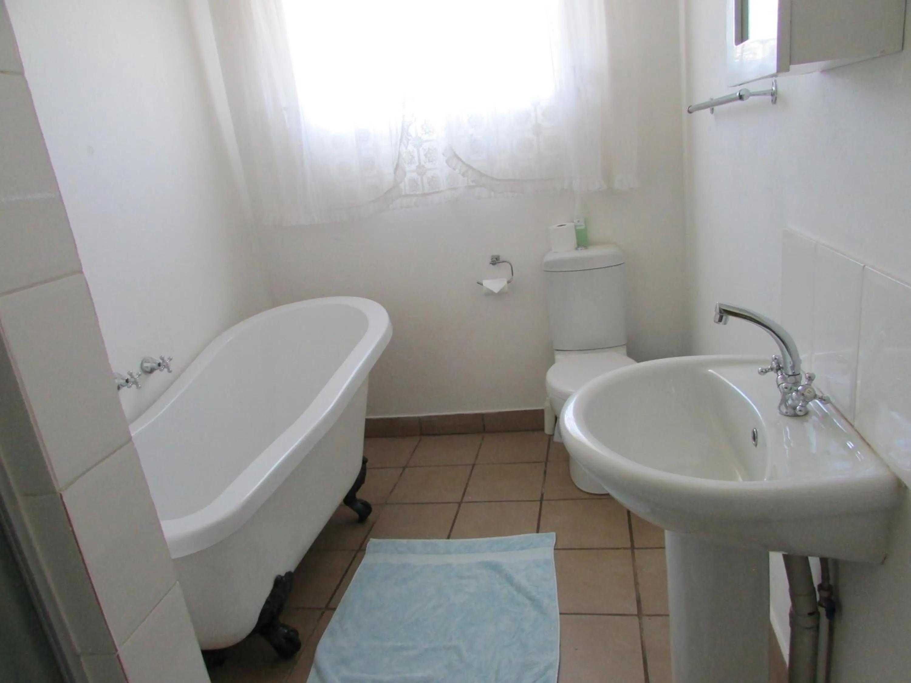 Bathroom in Absolute Leisure Cottages