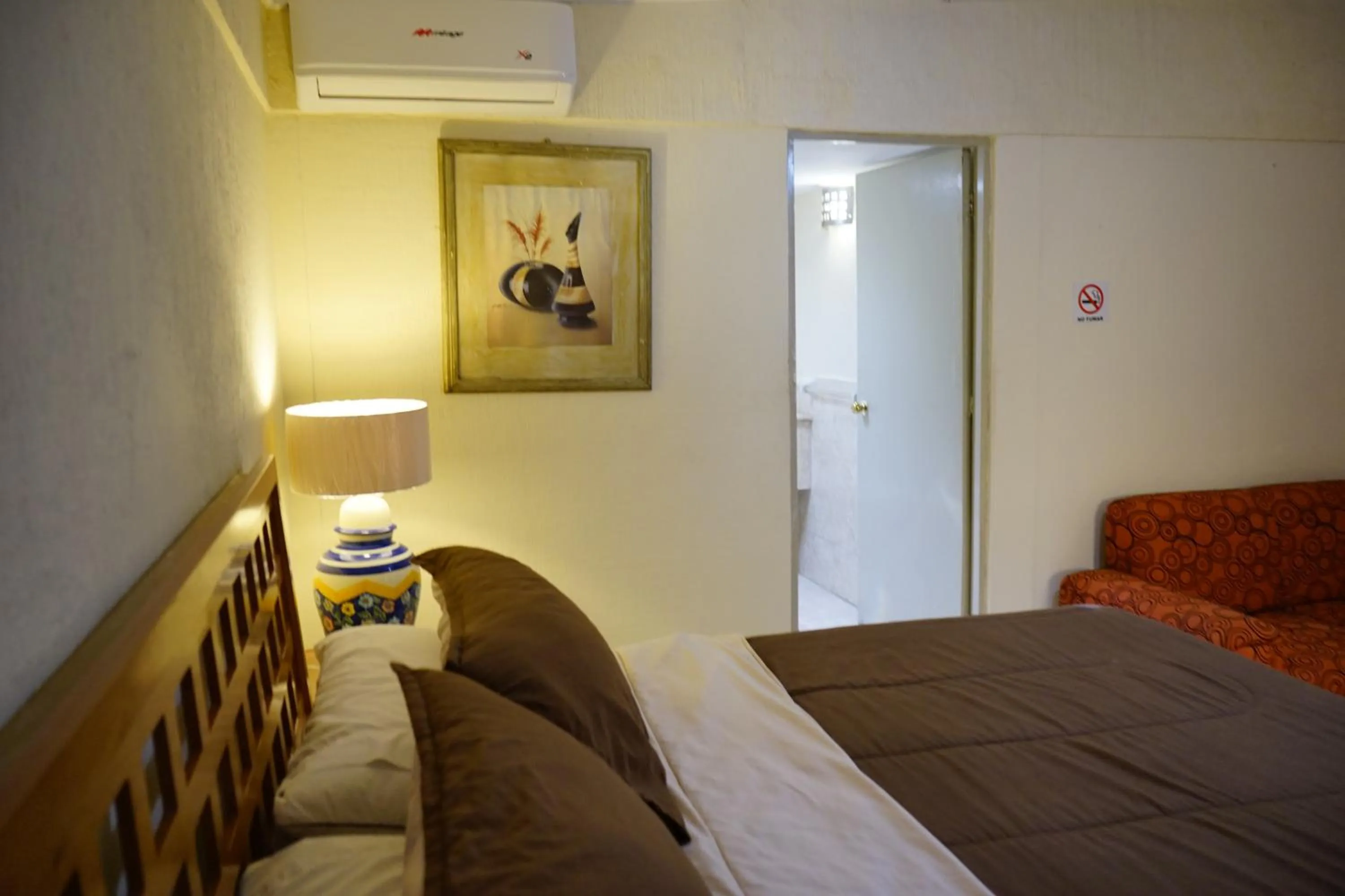 Bed in Hotel Posada del Sol Inn