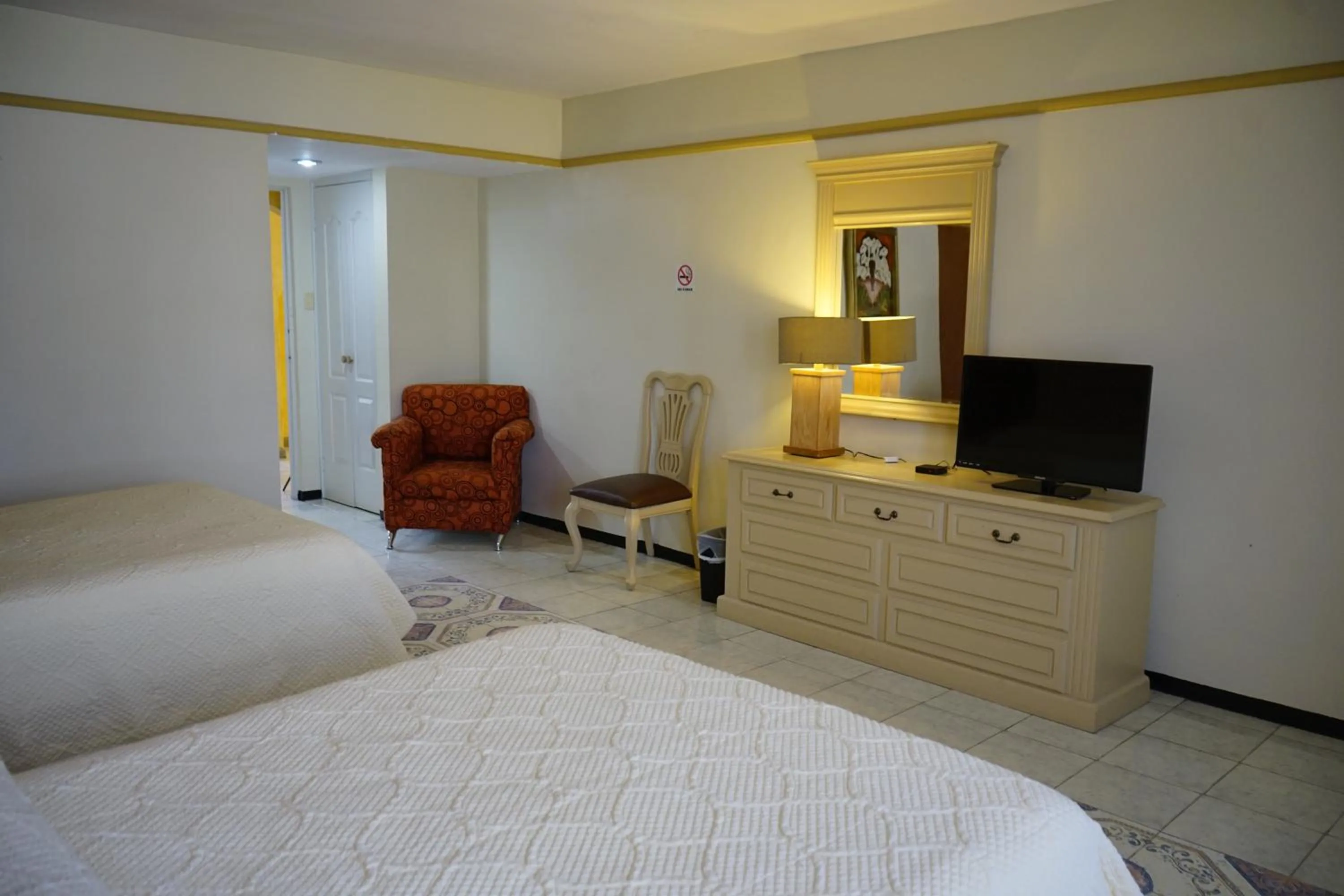 Bed in Hotel Posada del Sol Inn