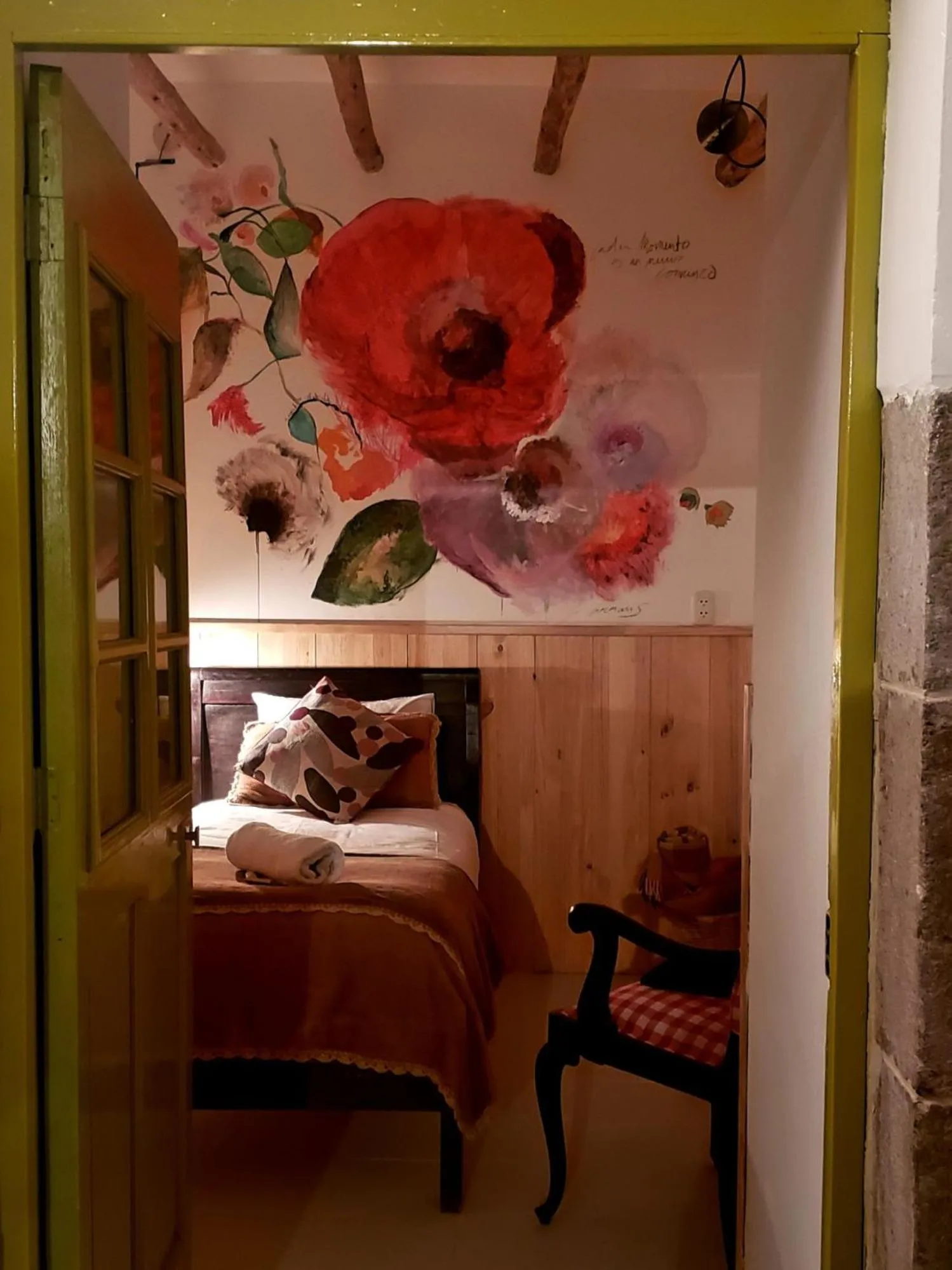 Bed in Niños Hotel Meloc