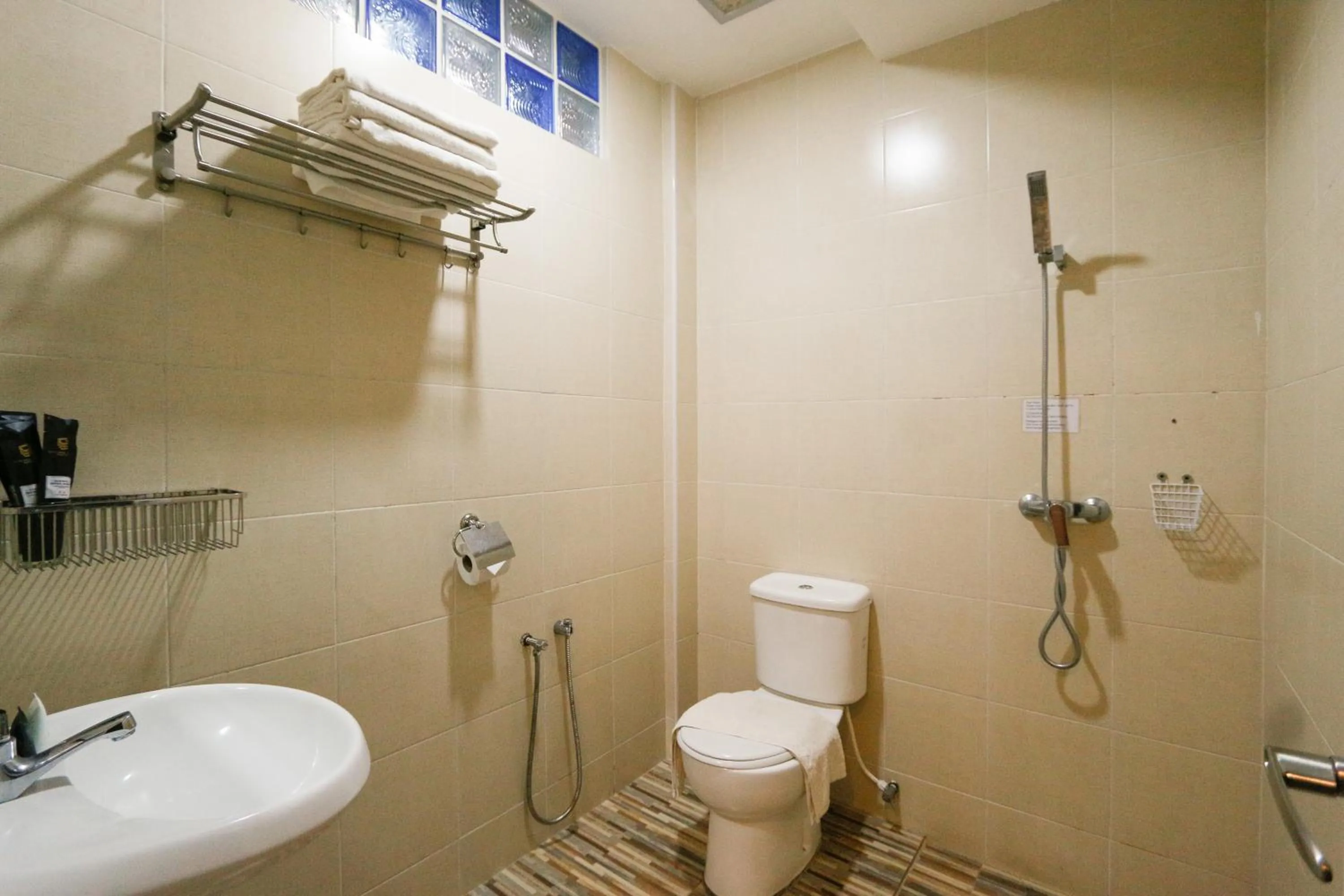 Shower in Travelland Hotel