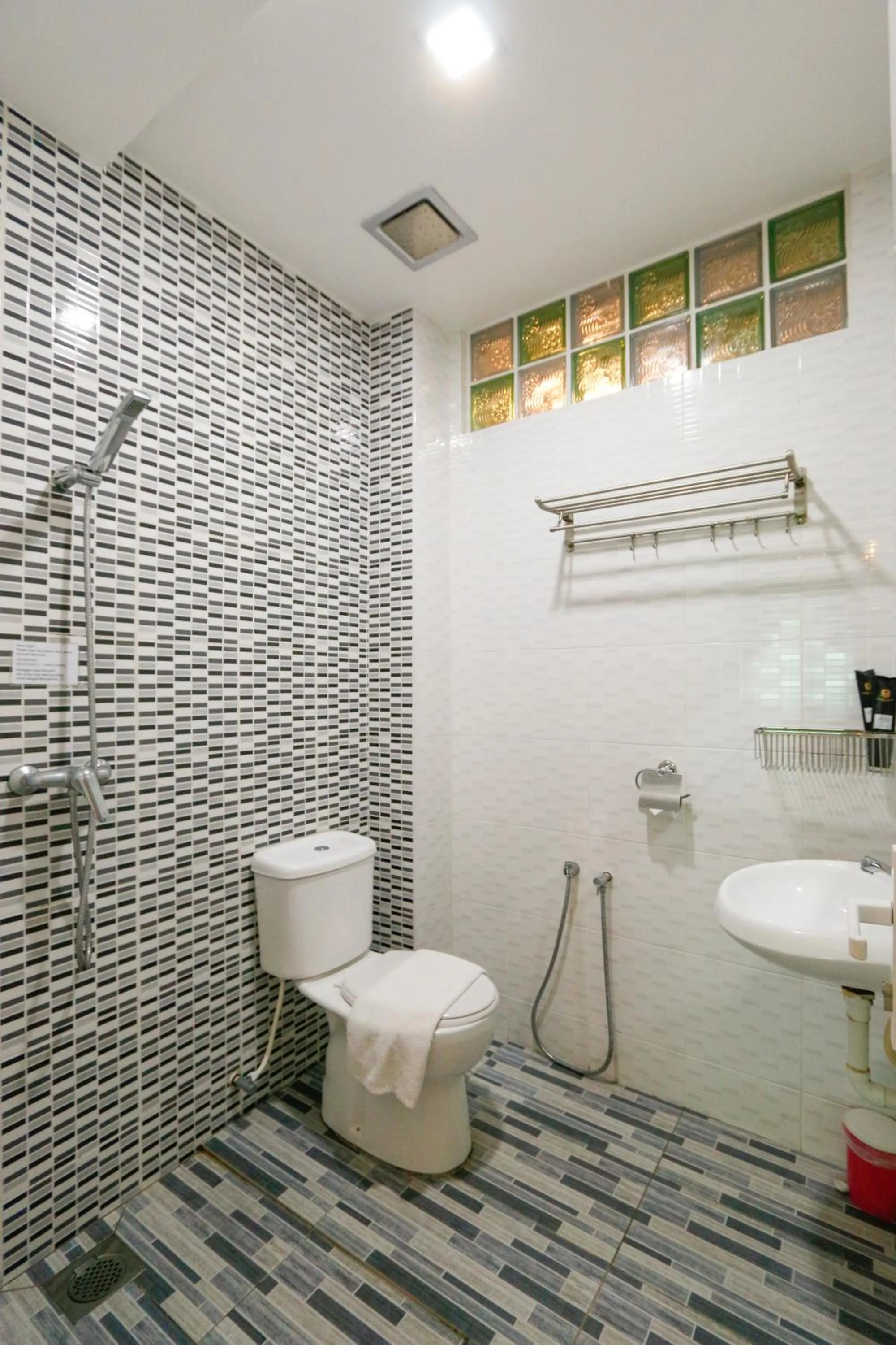 Shower in Travelland Hotel