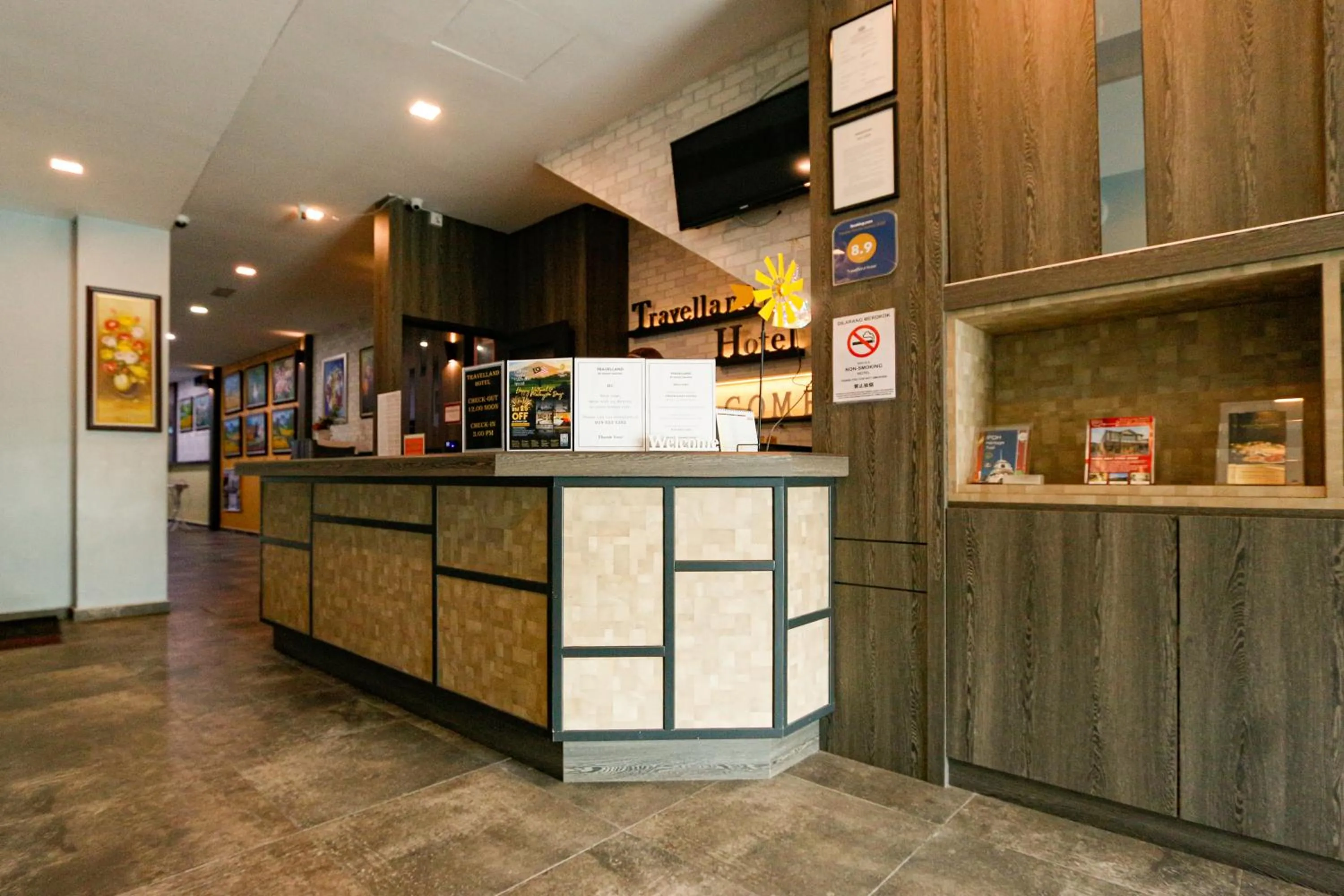 Lobby or reception in Travelland Hotel