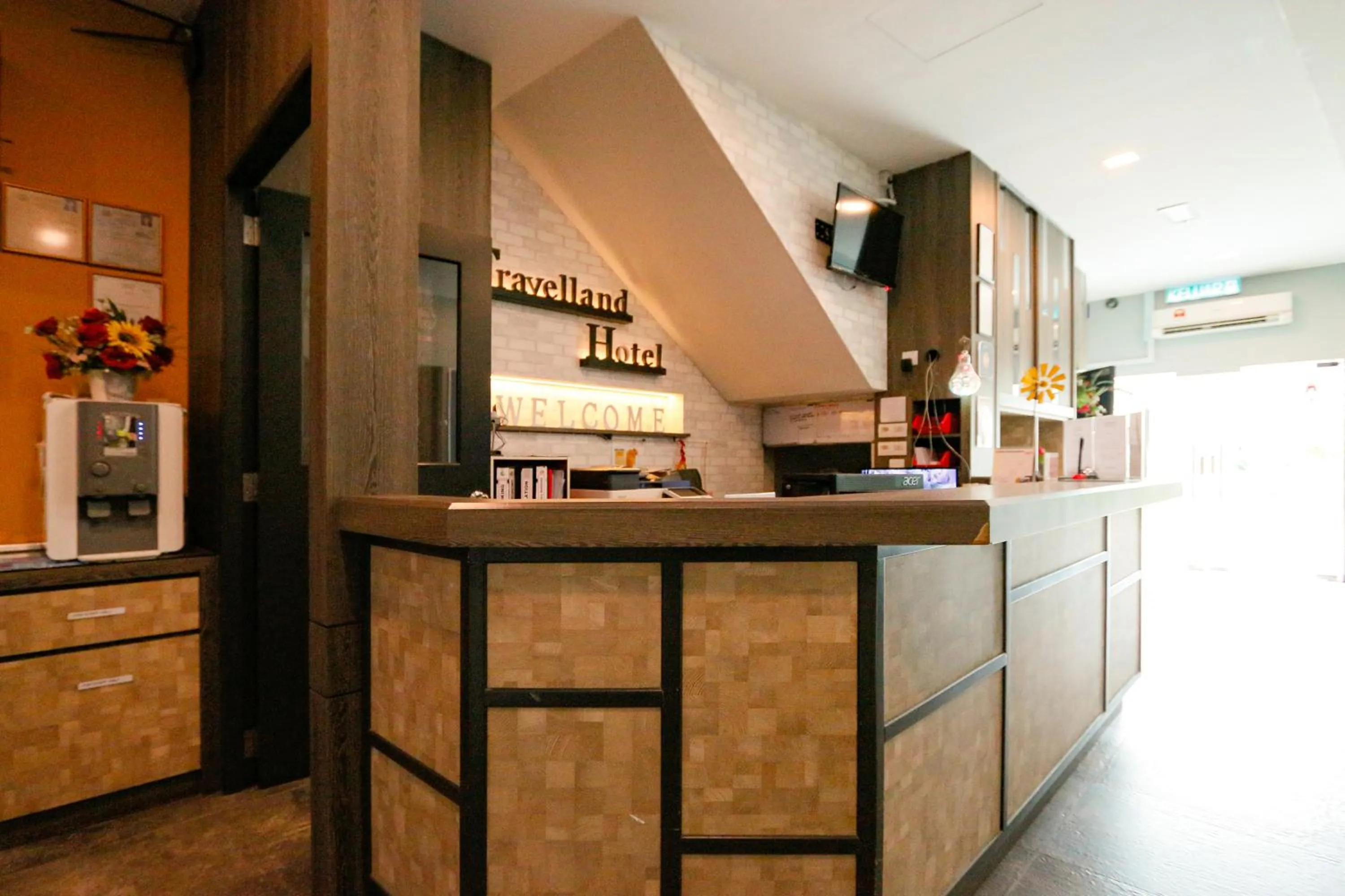 Lobby or reception in Travelland Hotel