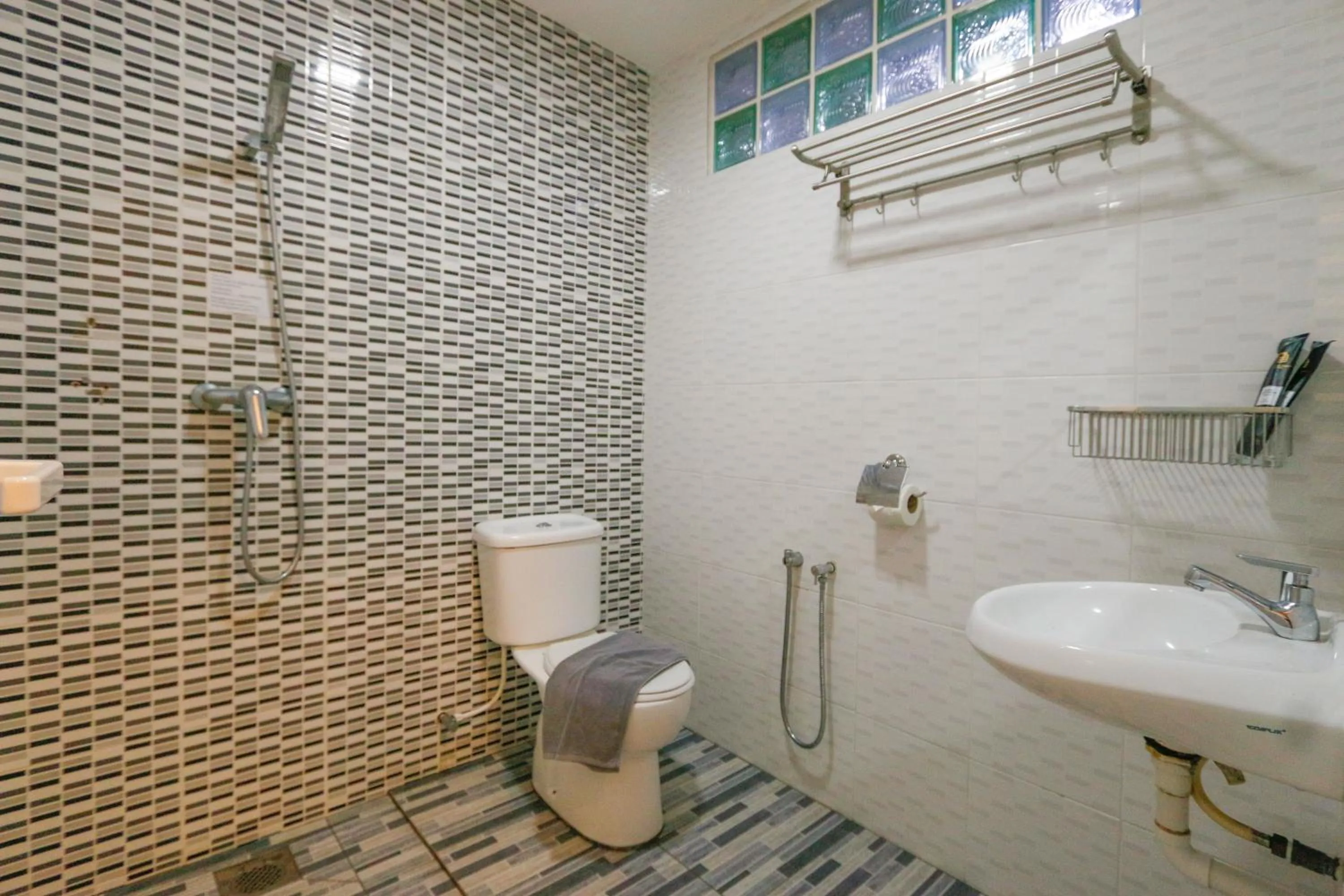 Shower in Travelland Hotel