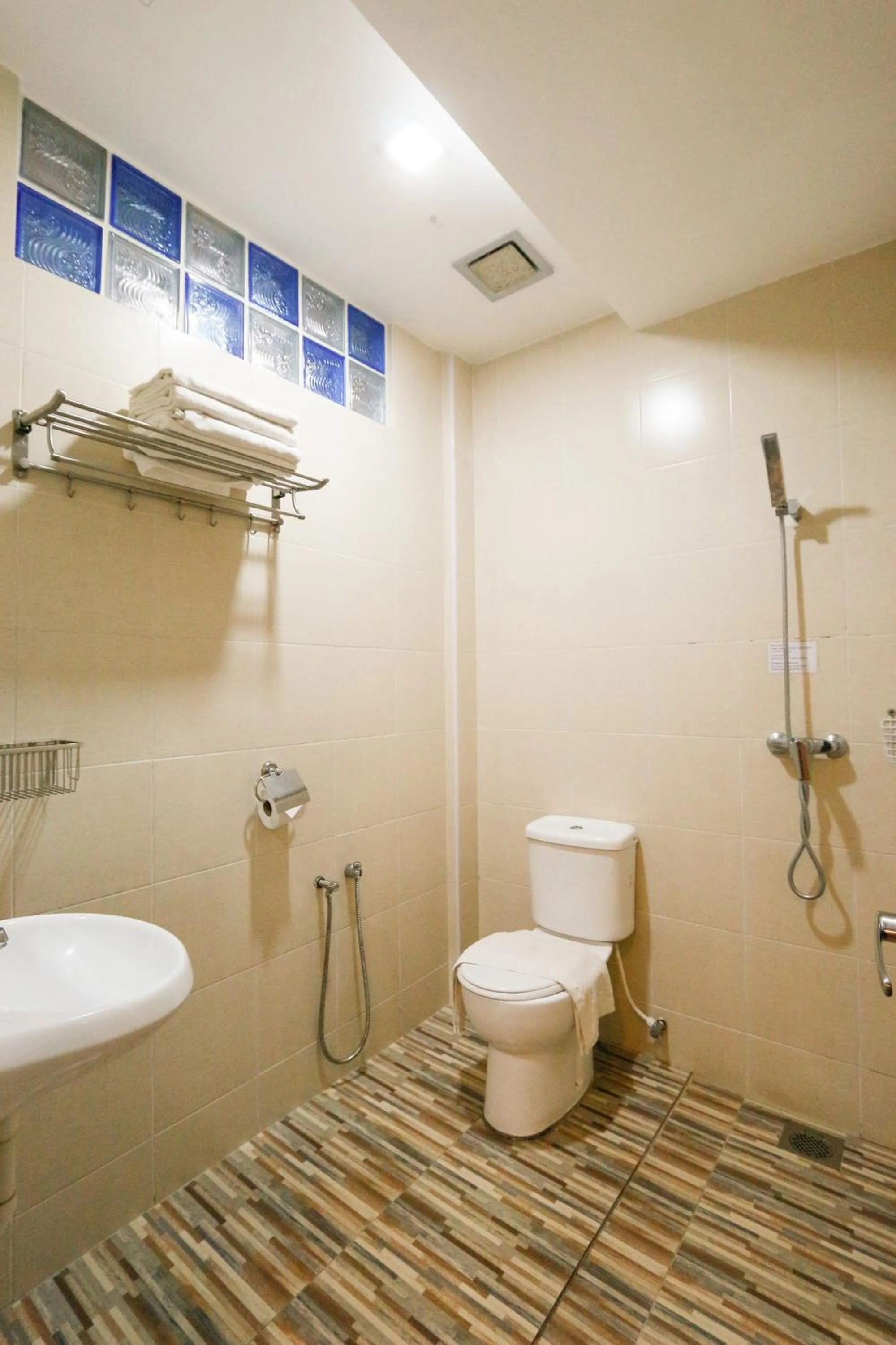 Shower in Travelland Hotel