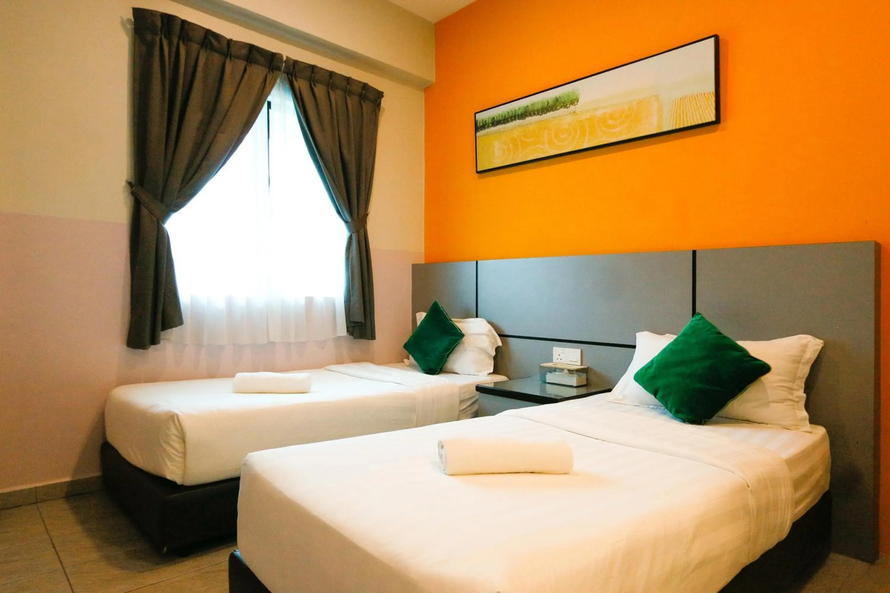 Bed in Travelland Hotel