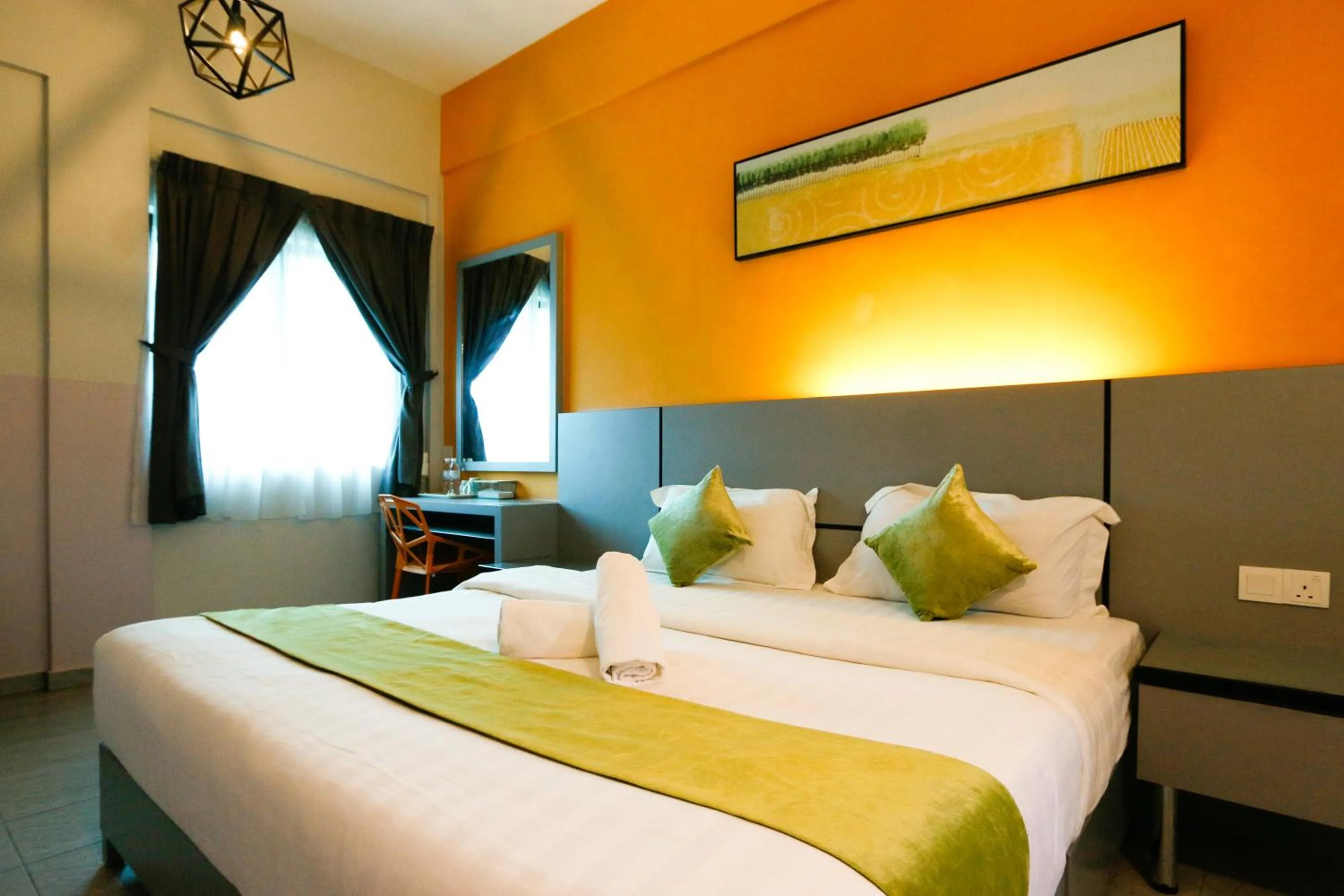 Bed in Travelland Hotel