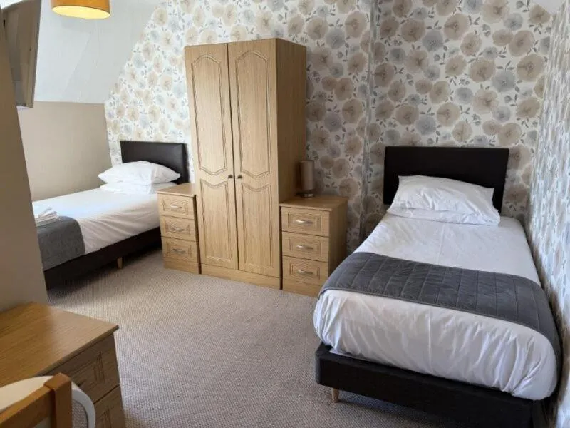 Bed in The Avenue Hotel