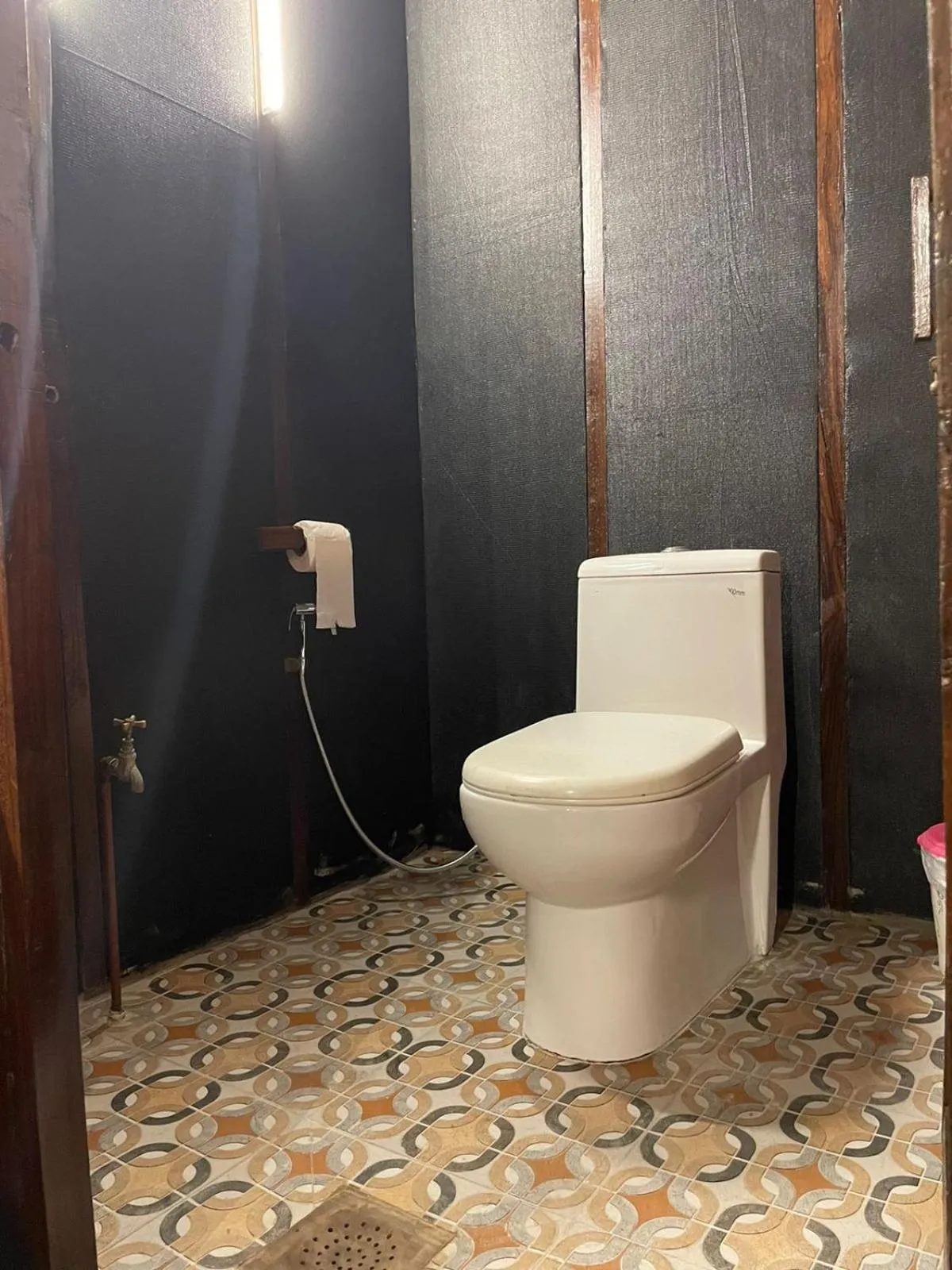 Toilet in Dunhill Beach Resort